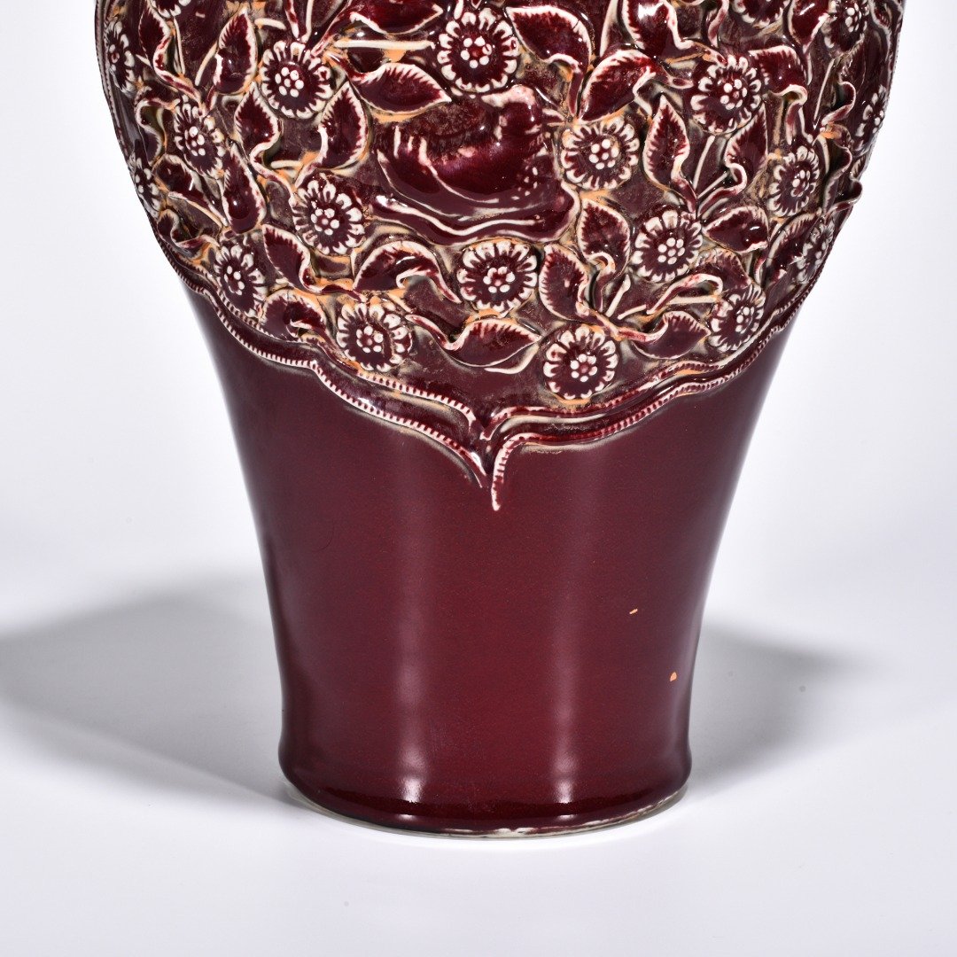 Yuan Dynasty red glaze laminated mandarin duck flower pattern animal ear disc-mouth bottle