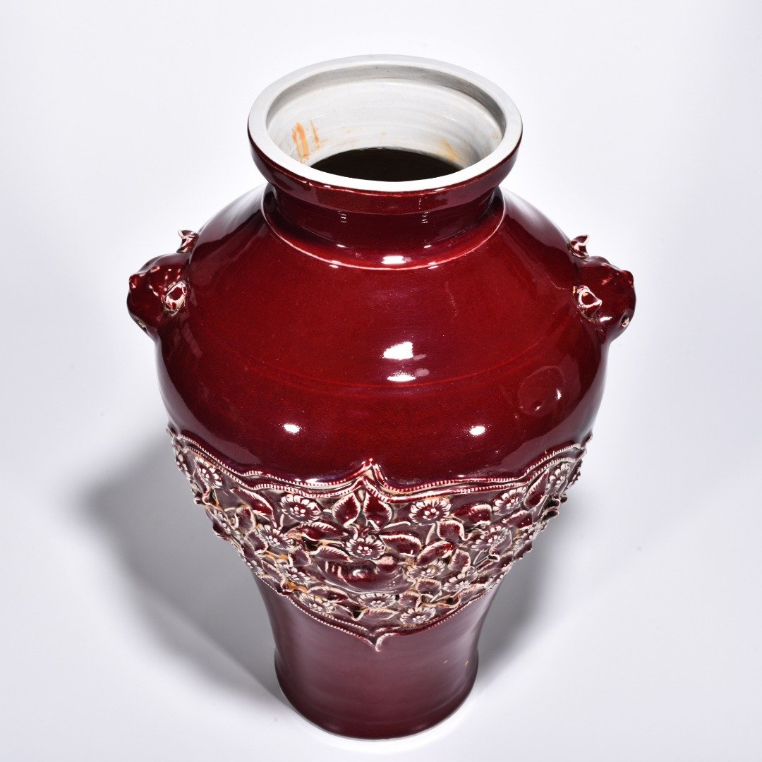 Yuan Dynasty red glaze laminated mandarin duck flower pattern animal ear disc-mouth bottle