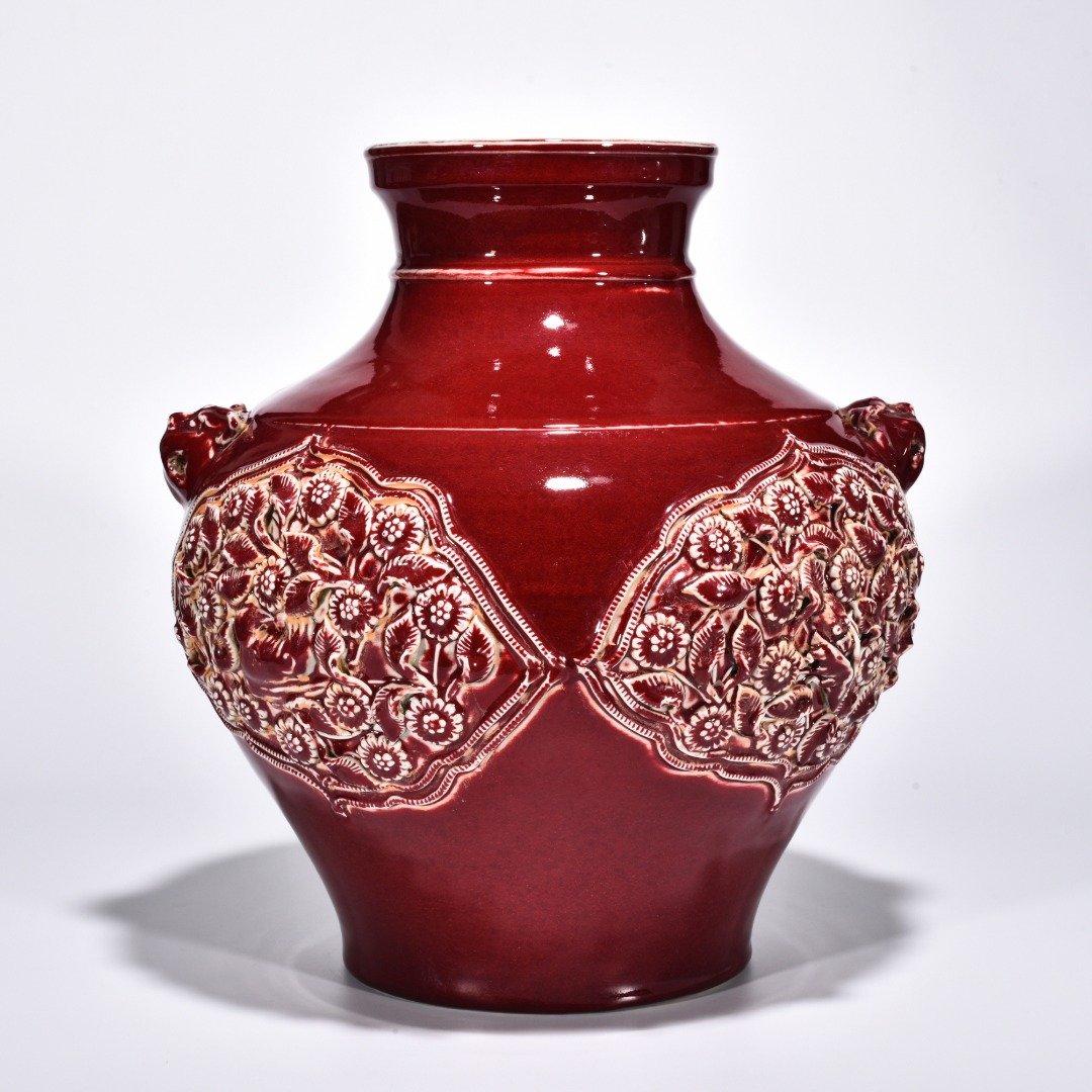 Yuan Dynasty red glazed mandarin duck and flower pattern animal ear jar