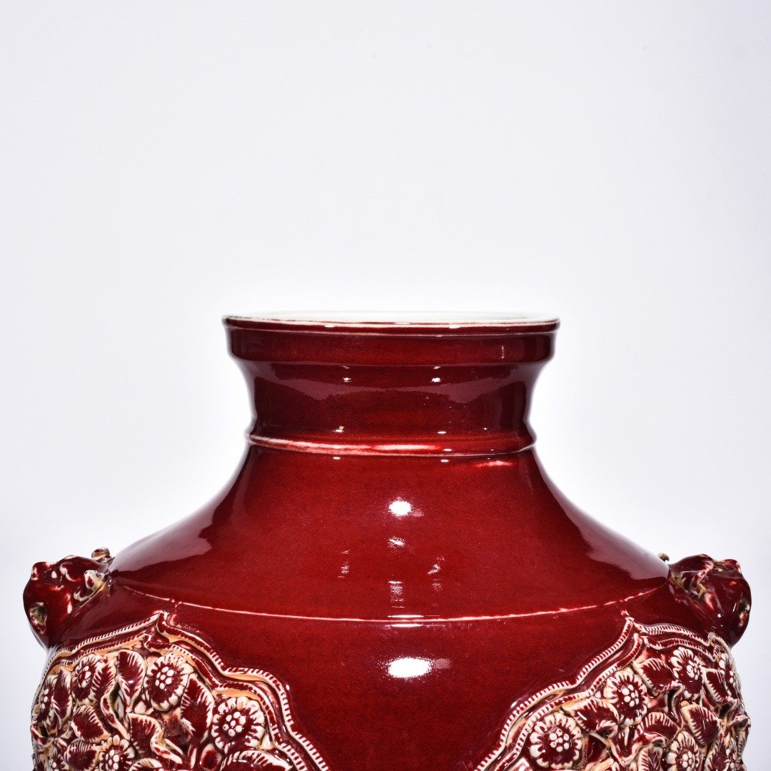 Yuan Dynasty red glazed mandarin duck and flower pattern animal ear jar