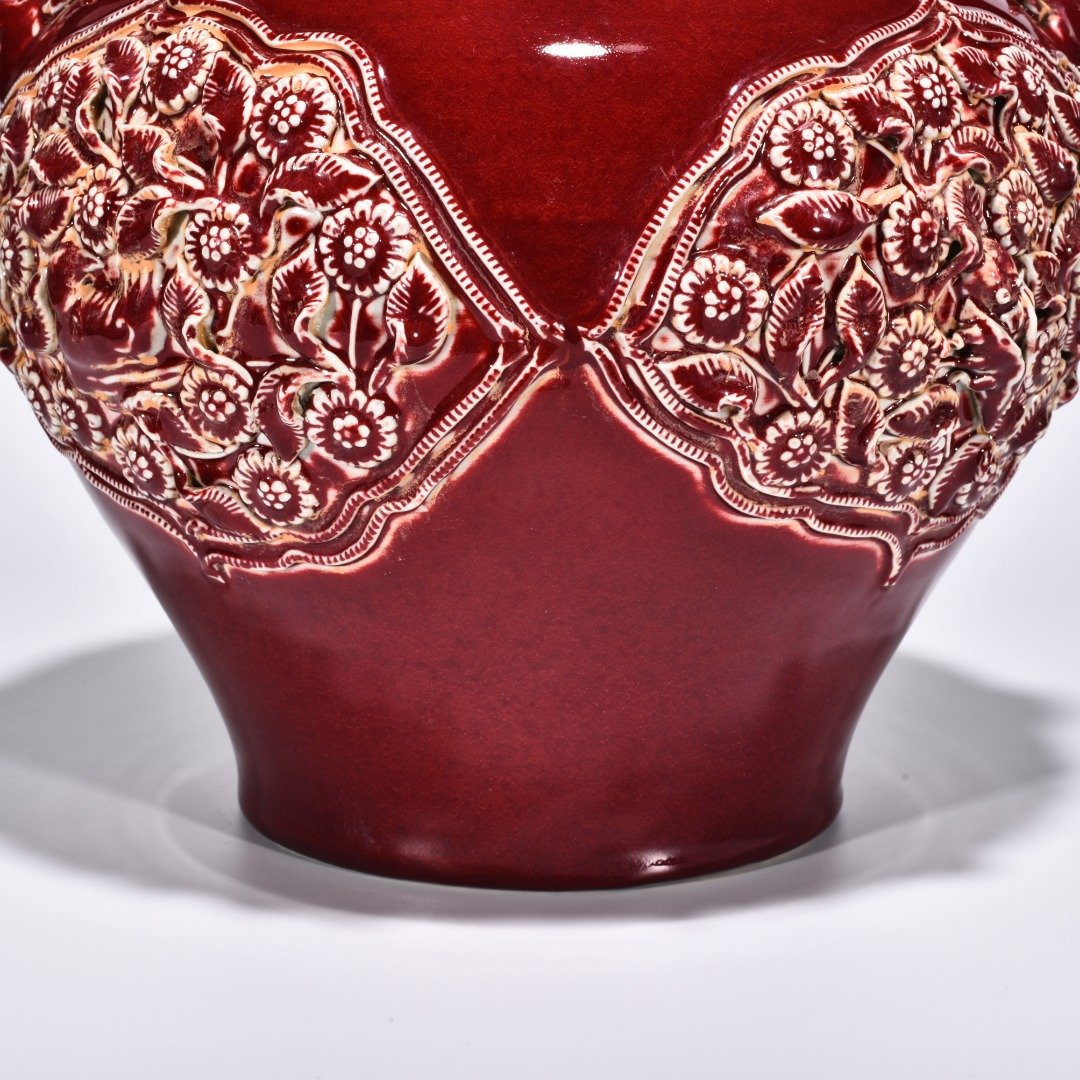 Yuan Dynasty red glazed mandarin duck and flower pattern animal ear jar
