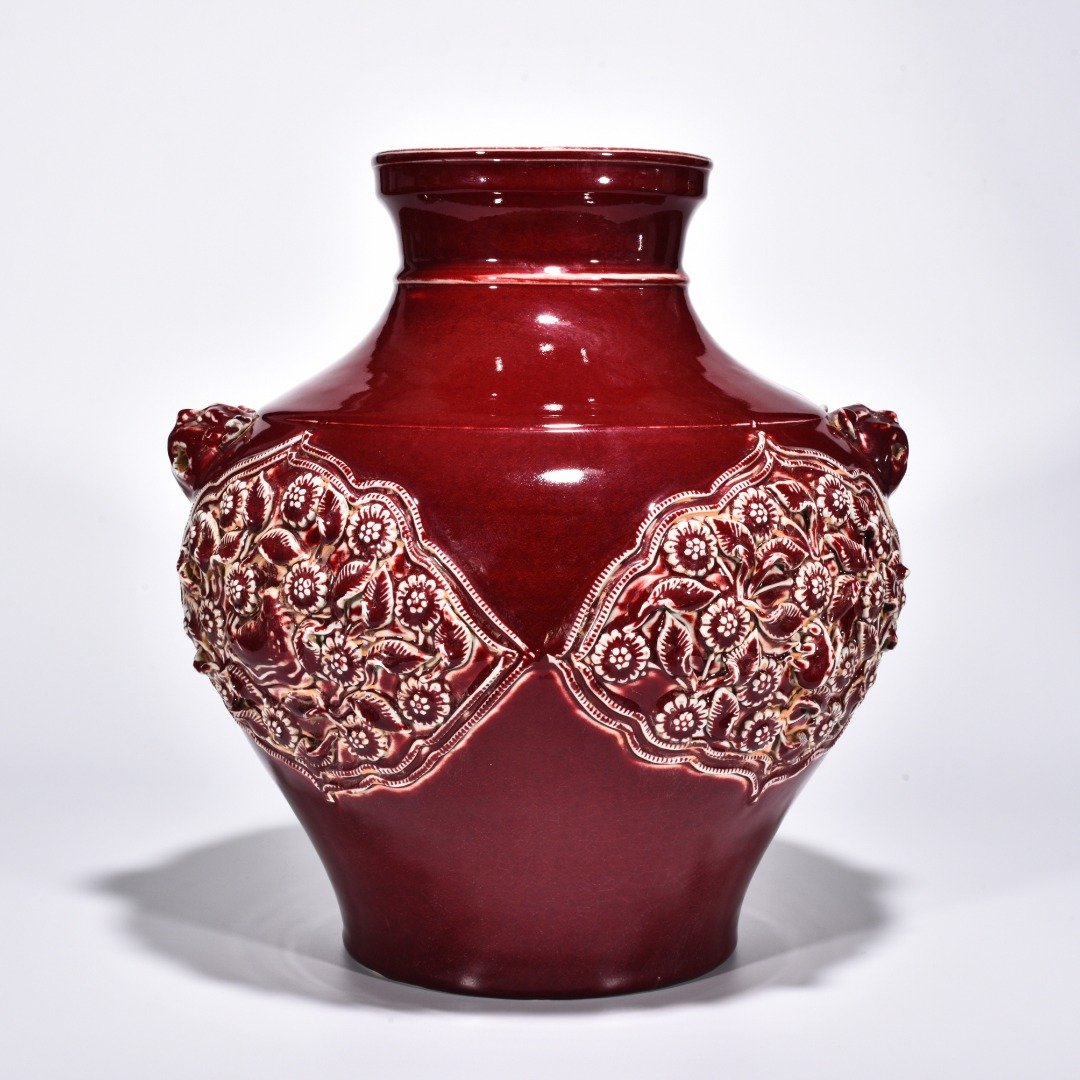 Yuan Dynasty red glazed mandarin duck and flower pattern animal ear jar