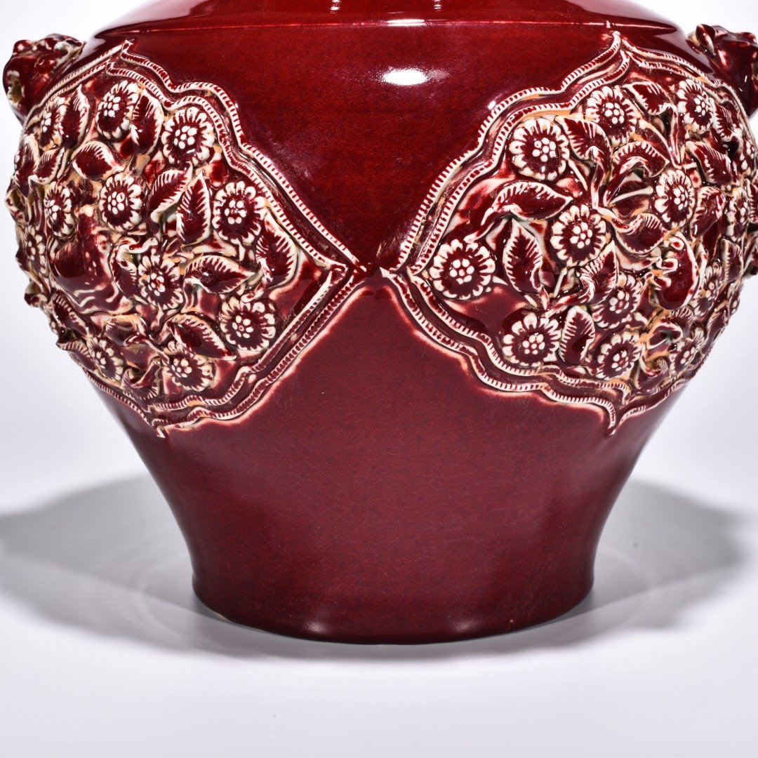 Yuan Dynasty red glazed mandarin duck and flower pattern animal ear jar