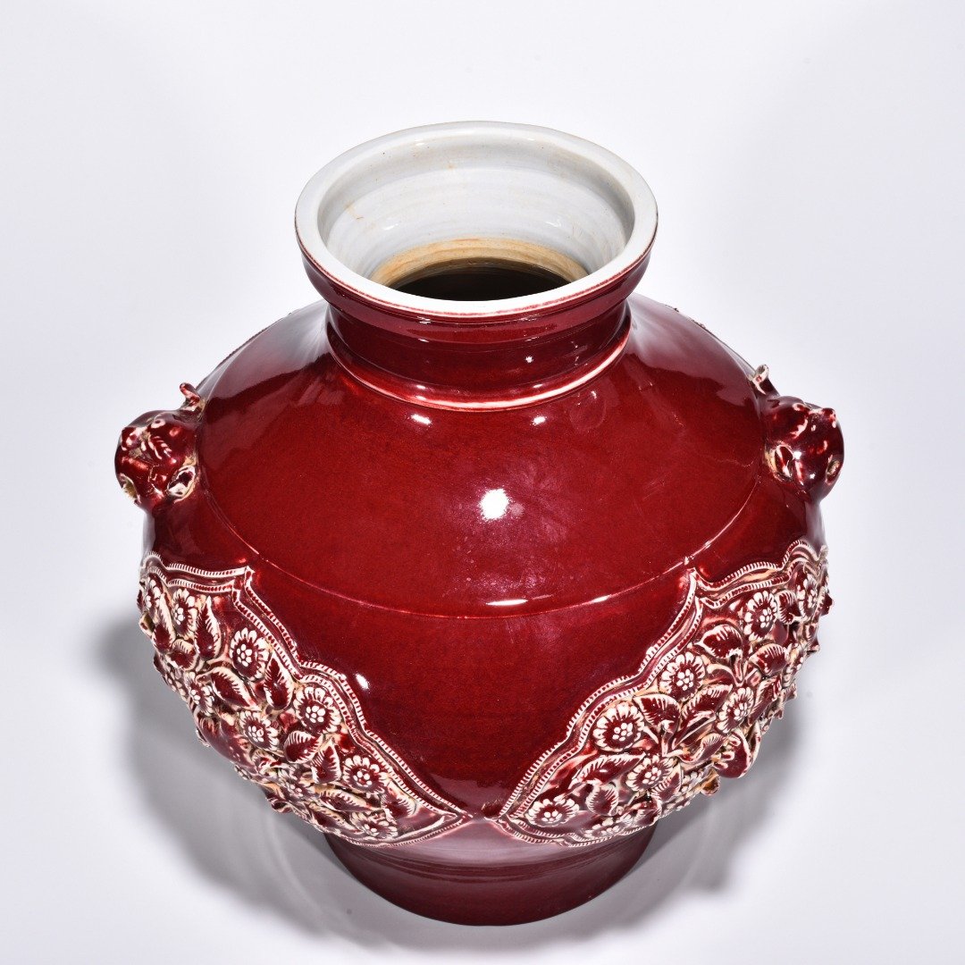 Yuan Dynasty red glazed mandarin duck and flower pattern animal ear jar