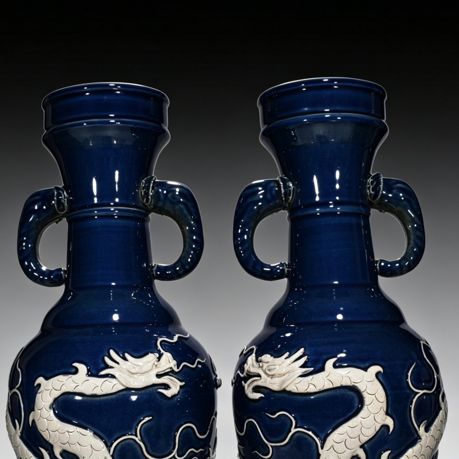Yuan Dynasty blue embossed cloud and dragon pattern elephant ear vase