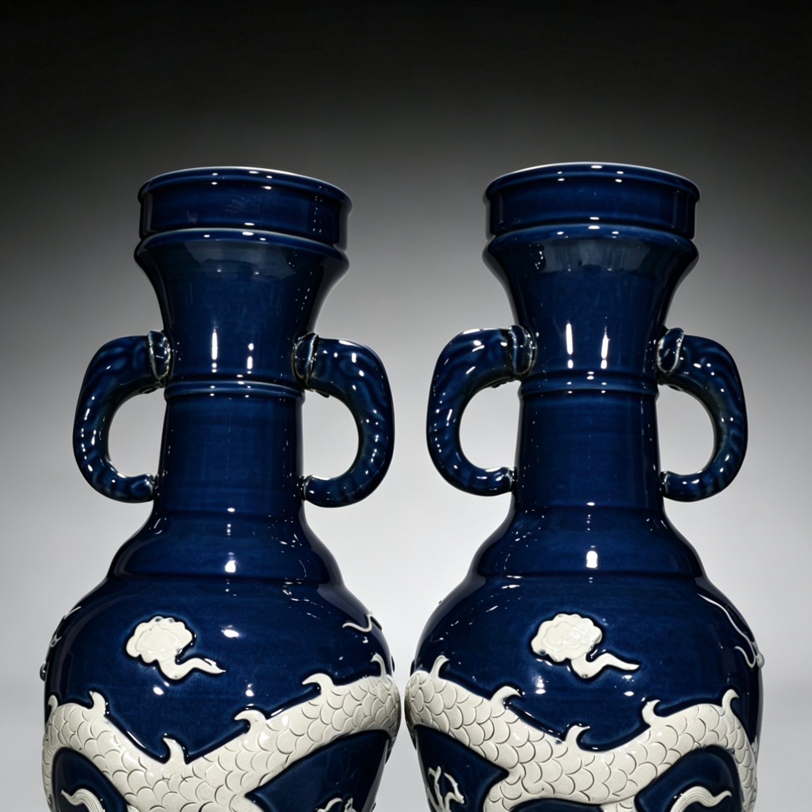 Yuan Dynasty blue embossed cloud and dragon pattern elephant ear vase