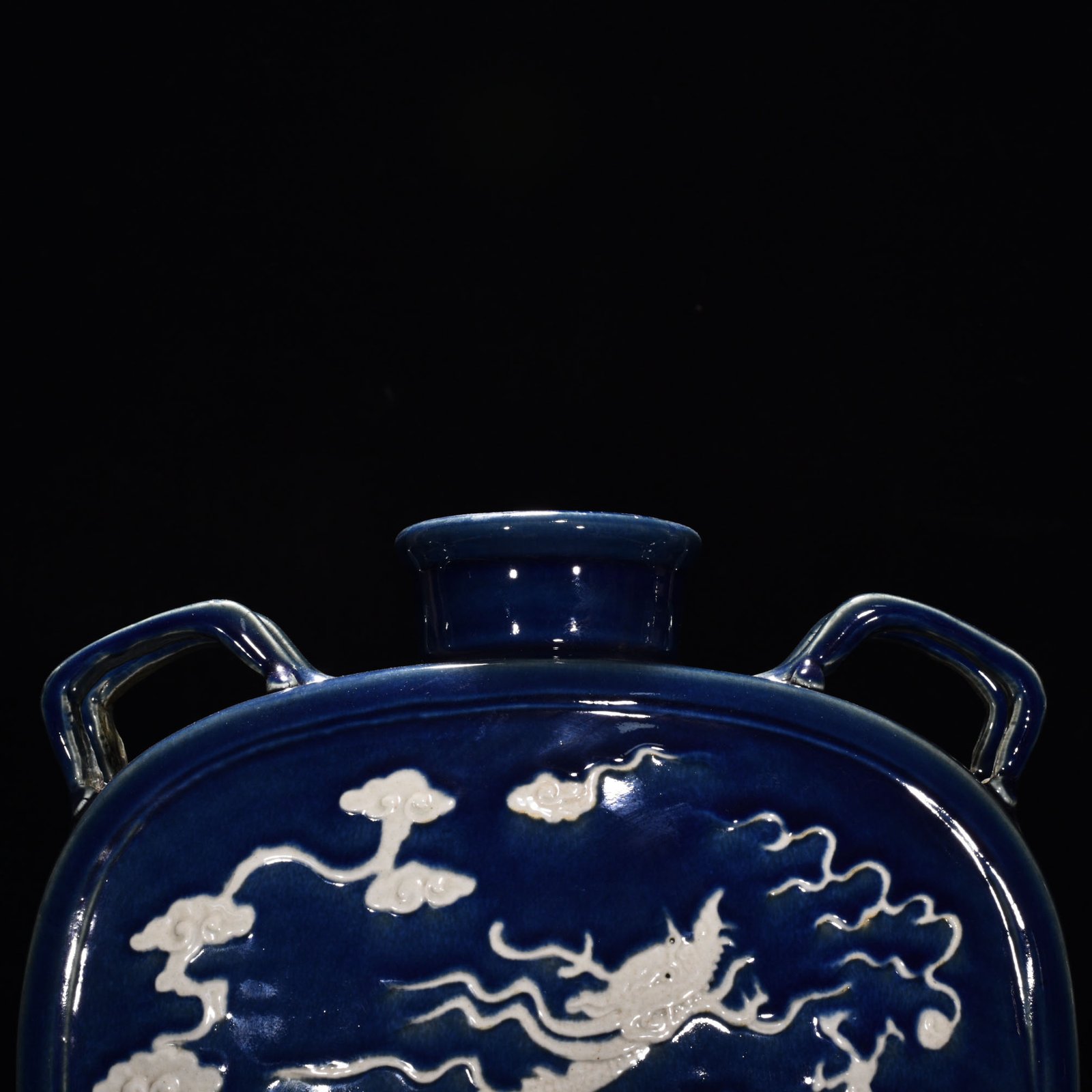 Yuan Dynasty blue glaze engraved with cloud and dragon pattern four series flat bottle