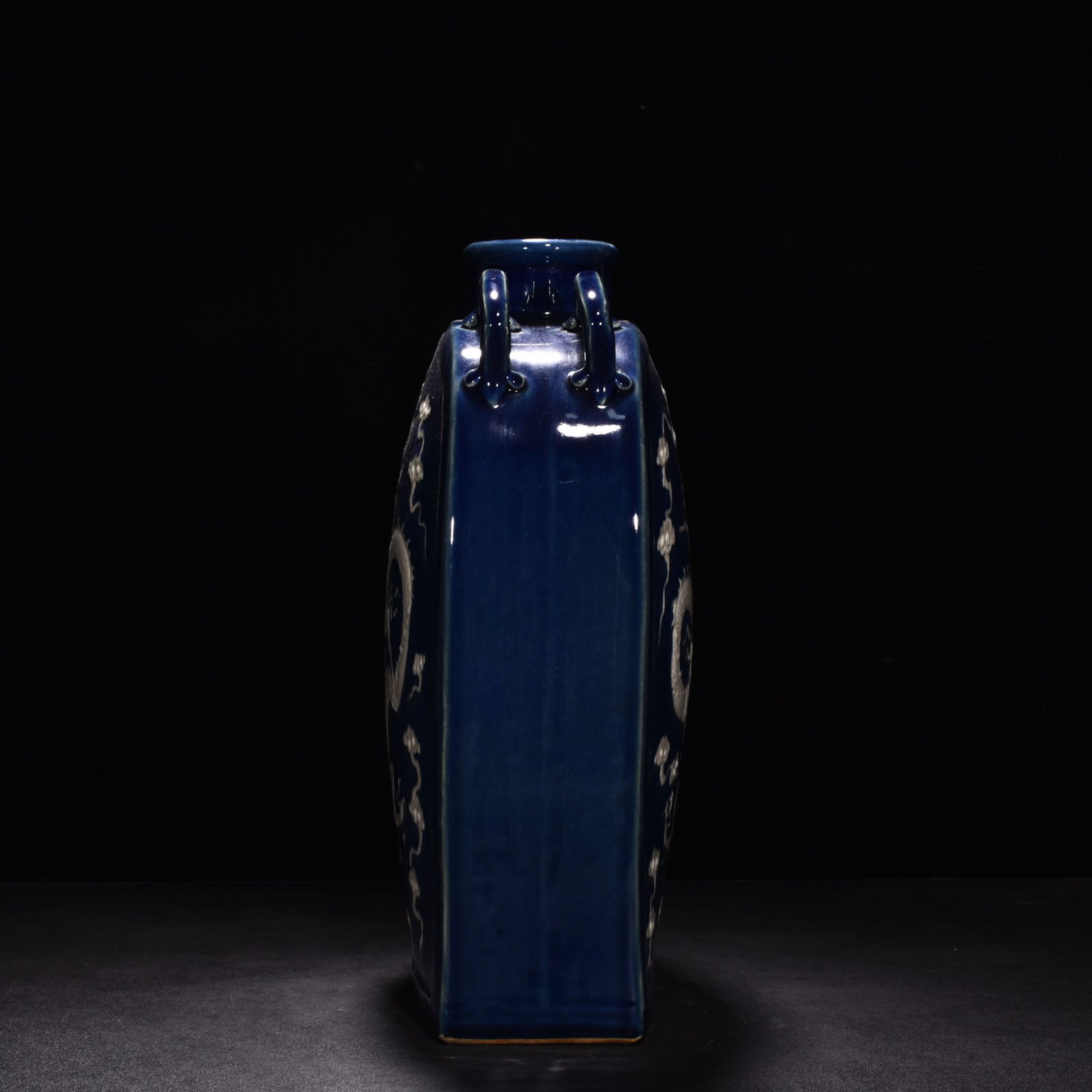 Yuan Dynasty blue glaze engraved with cloud and dragon pattern four series flat bottle