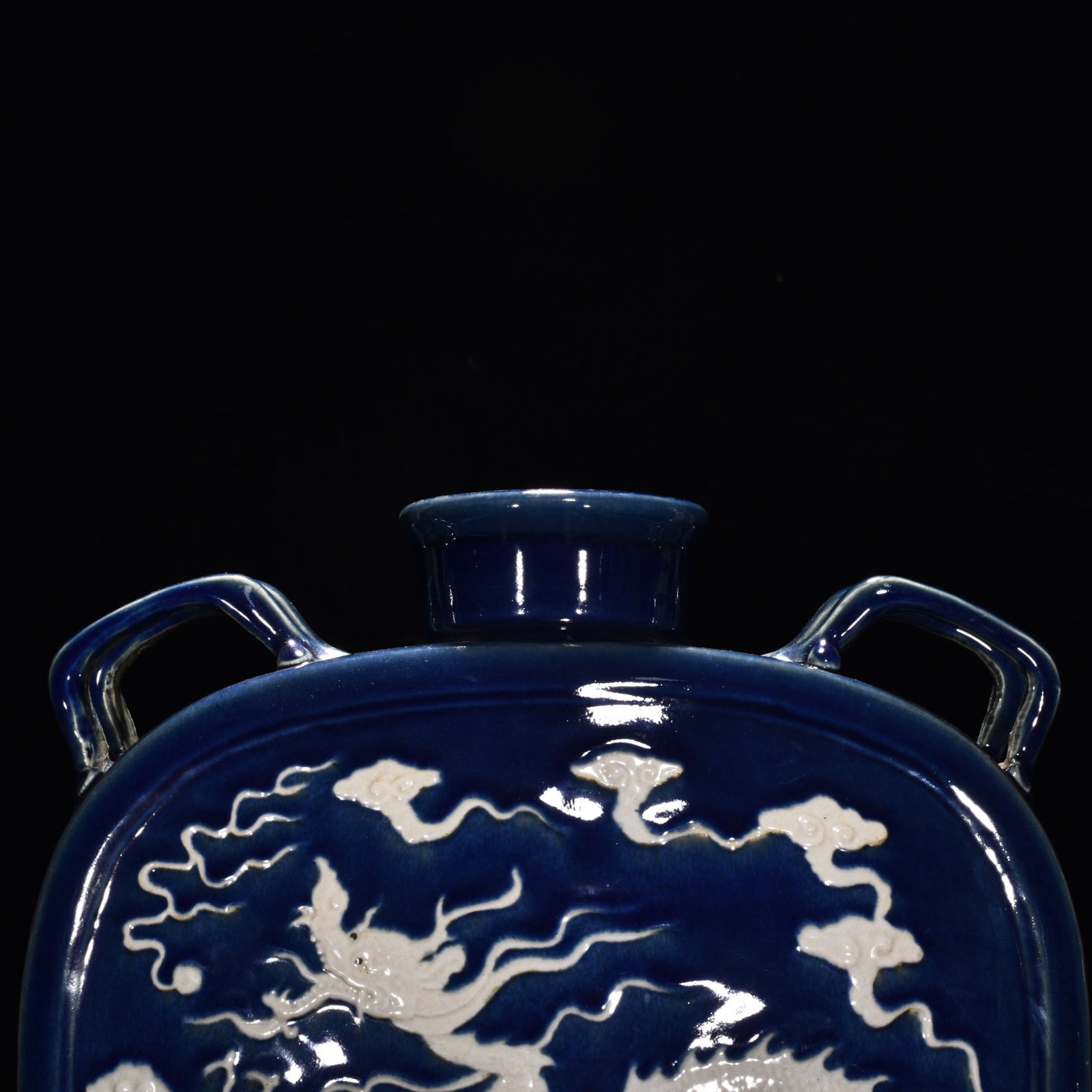 Yuan Dynasty blue glaze engraved with cloud and dragon pattern four series flat bottle