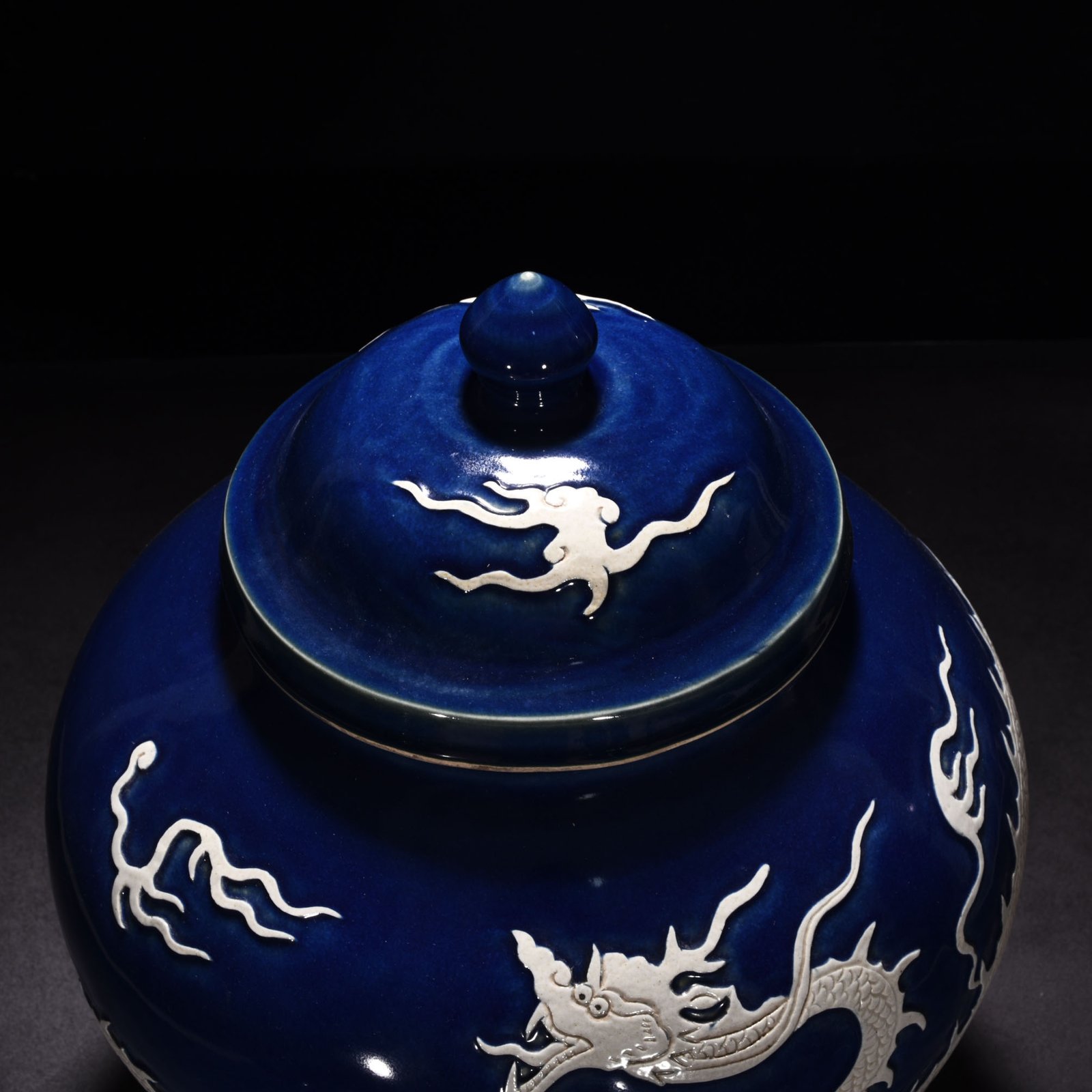 Yuan Dynasty blue glaze engraved cloud and dragon pattern lid jar