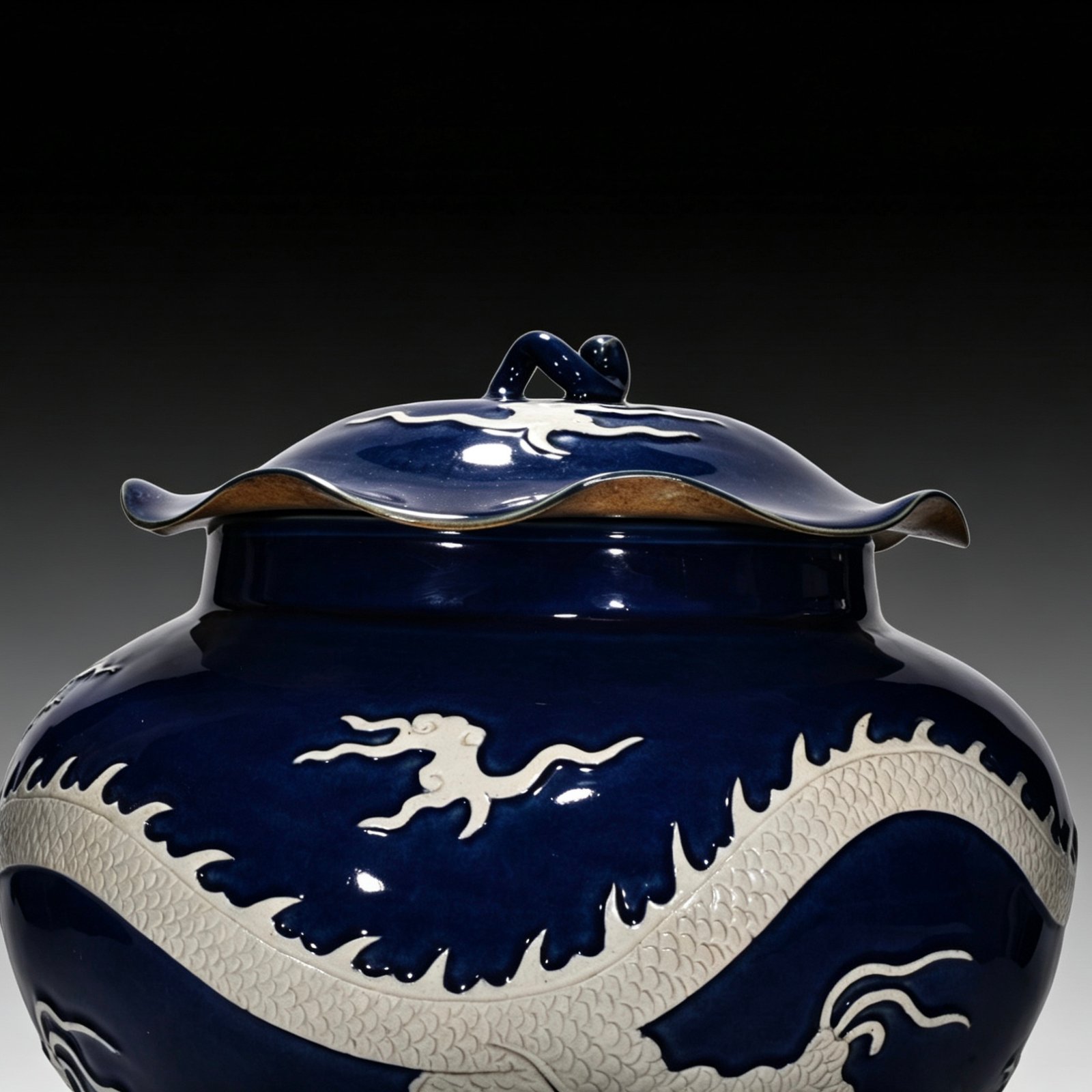 Yuan Dynasty blue-glazed lotus leaf jar with white engraved cloud and dragon pattern
