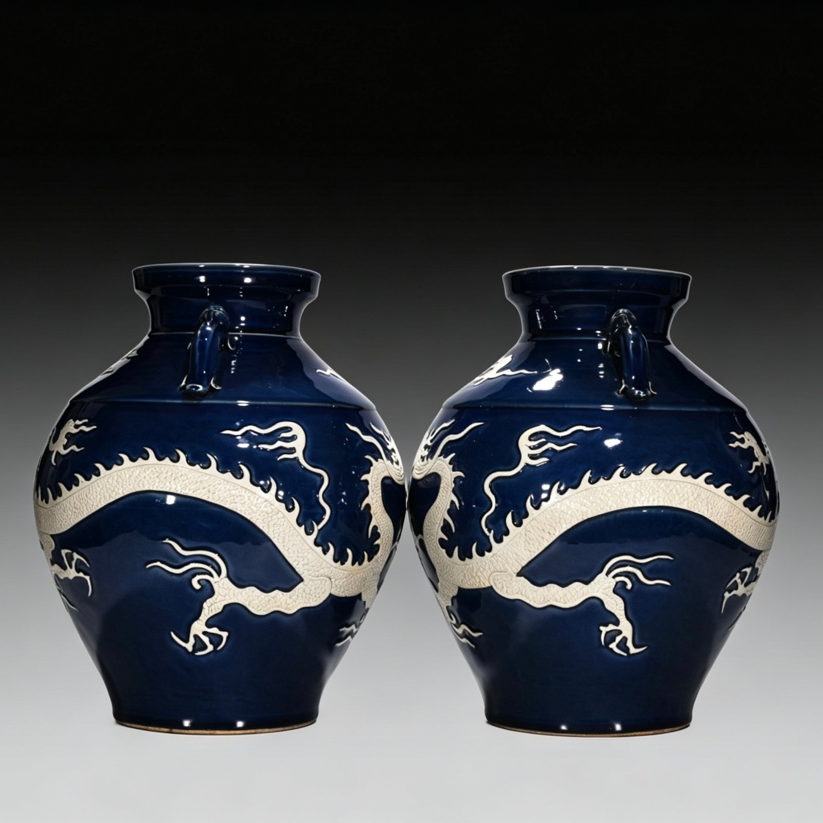 Yuan Dynasty blue glaze with white space and engraved cloud and dragon pattern on the ear jar