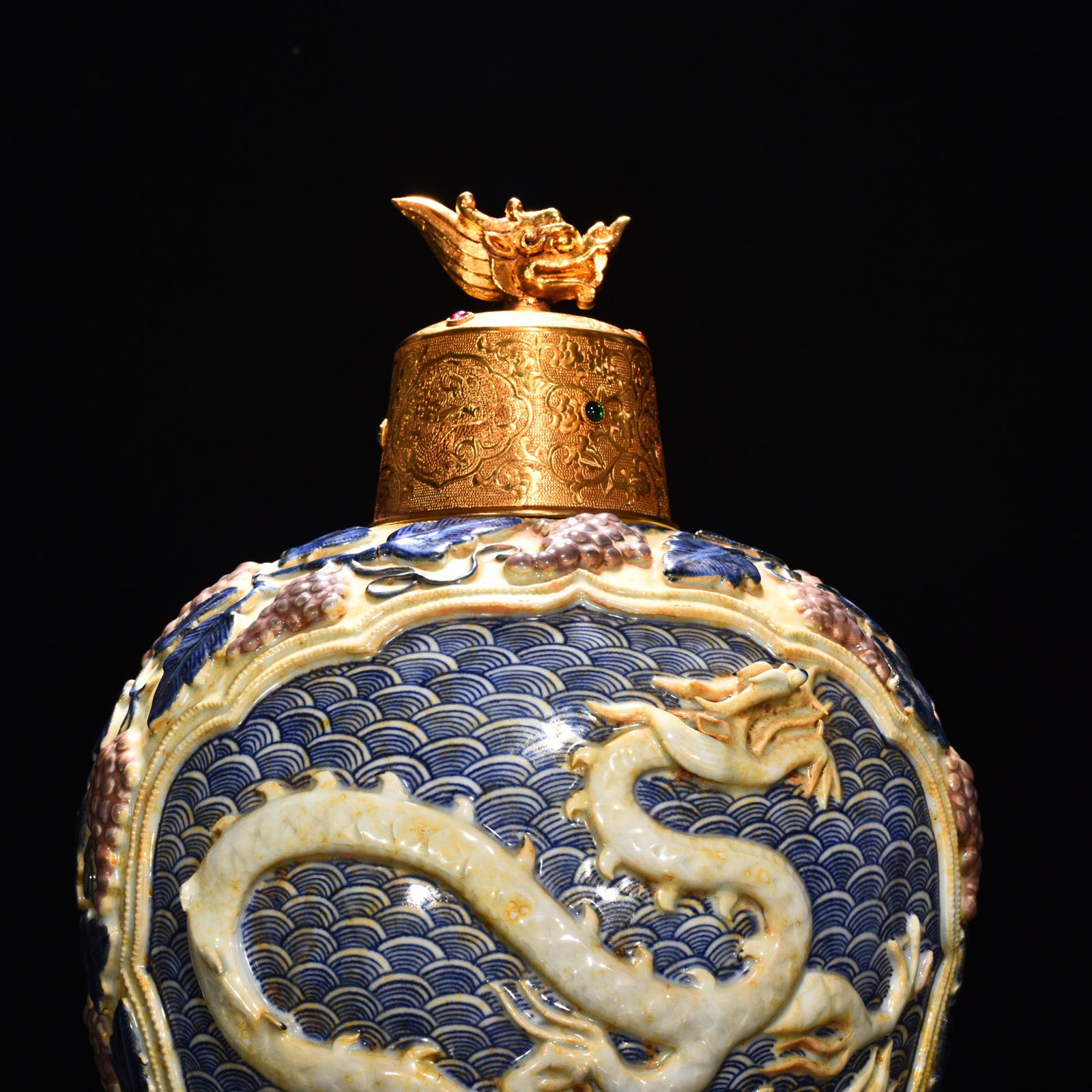 Yuan Dynasty blue and white underglaze red carved plum vase with sea water dragon pattern