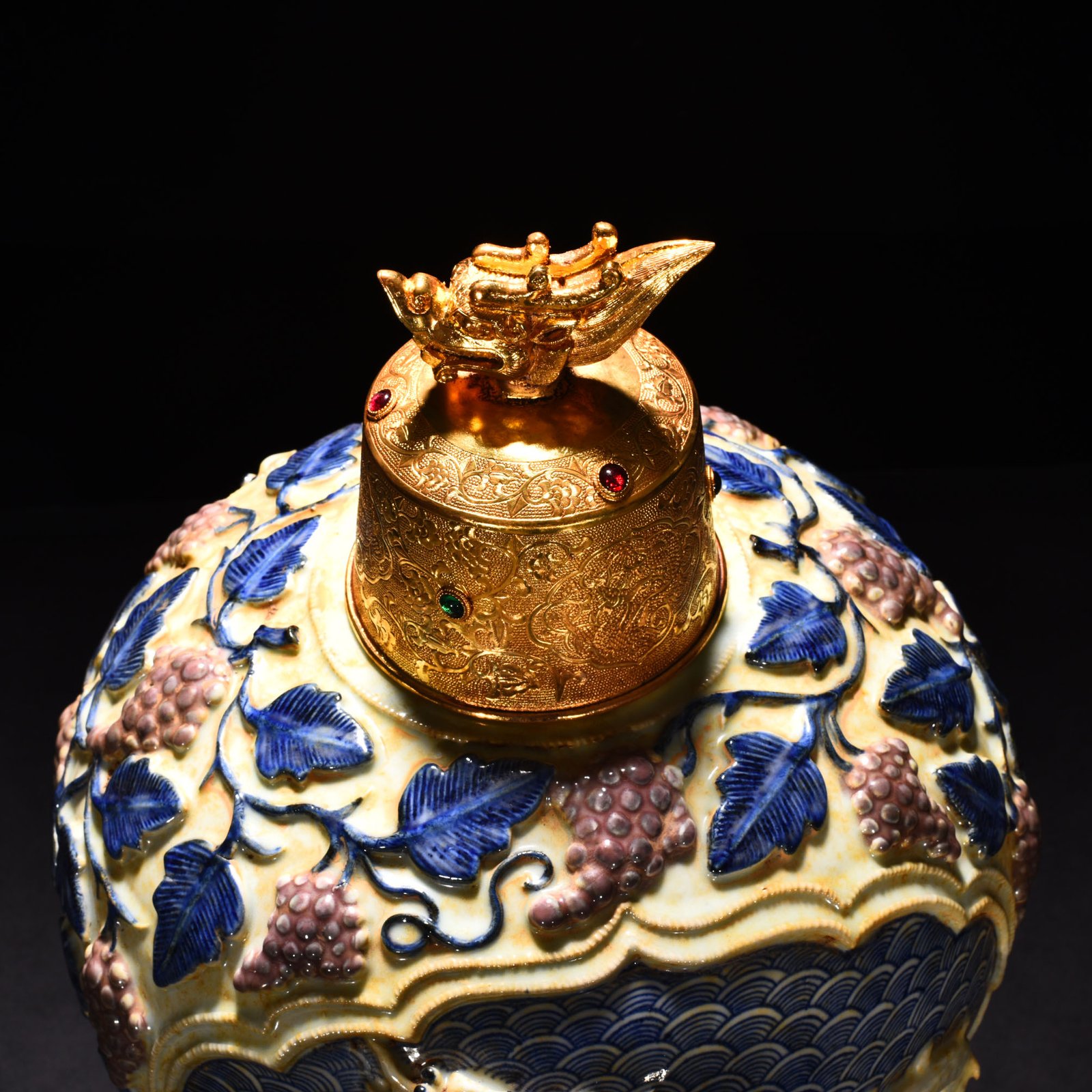 Yuan Dynasty blue and white underglaze red carved plum vase with sea water dragon pattern