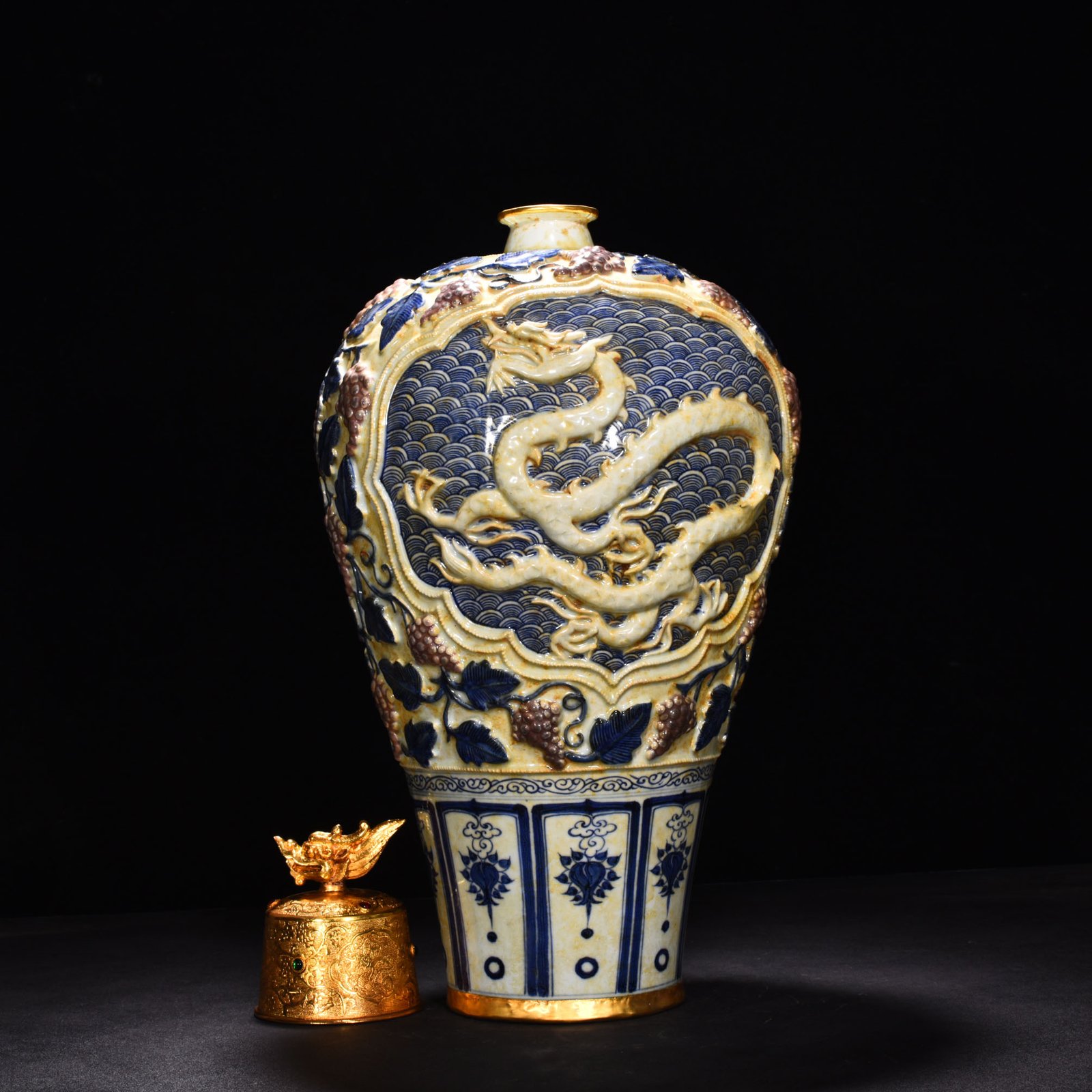 Yuan Dynasty blue and white underglaze red carved plum vase with sea water dragon pattern
