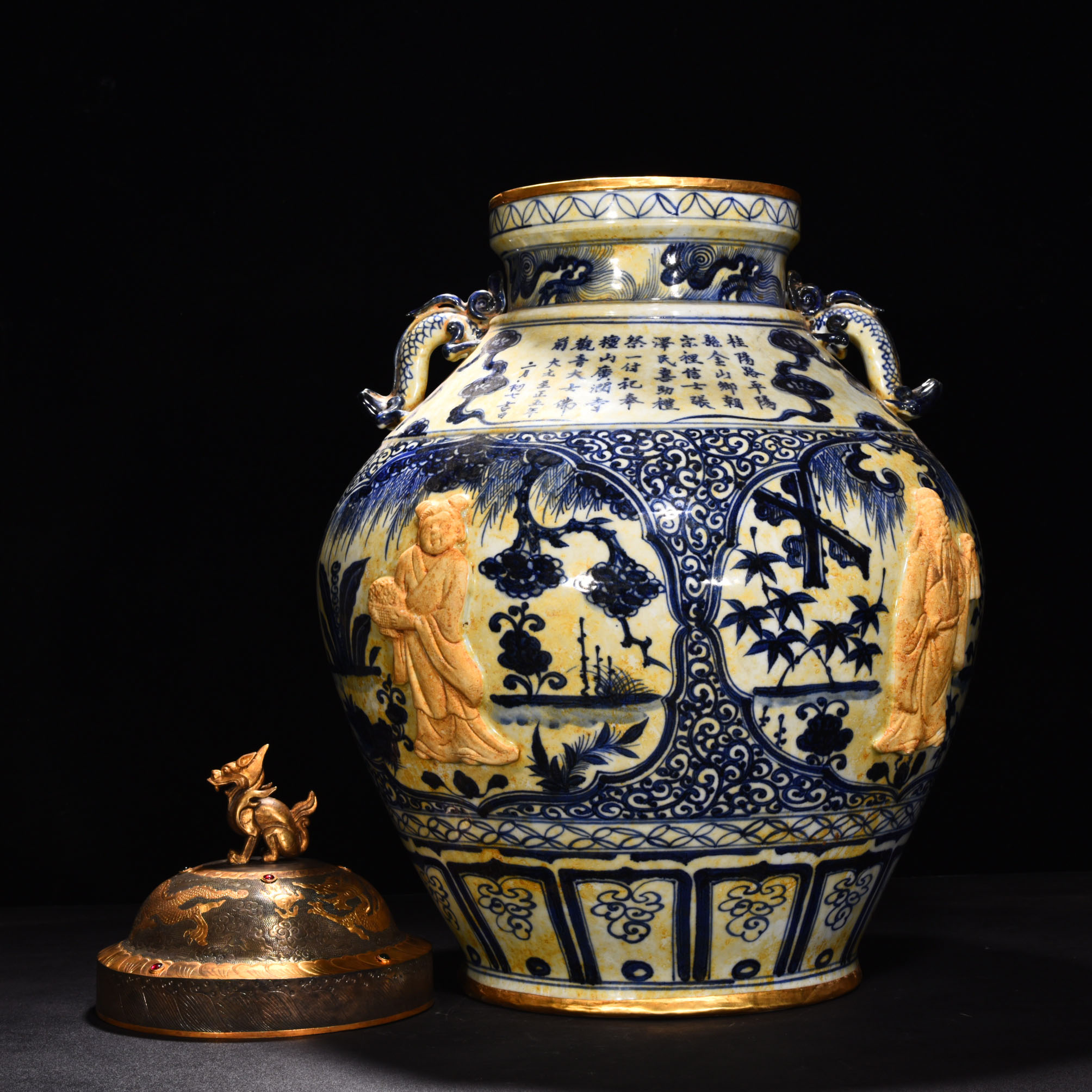 Yuan Dynasty blue and white carved earthenware jar with Eight Immortals and figures