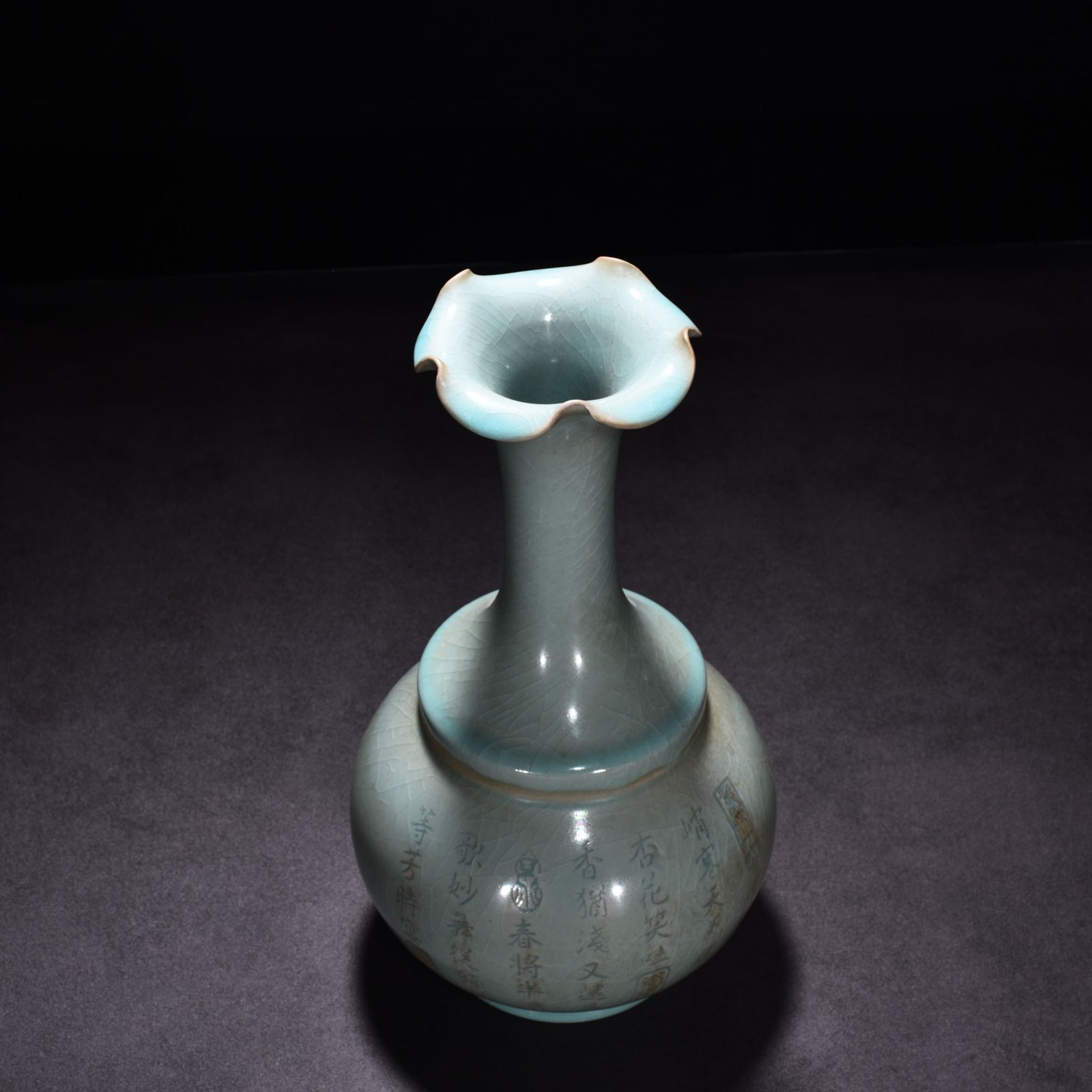Song Dynasty Ru kiln azure glaze engraved poetry pattern flower mouth vase