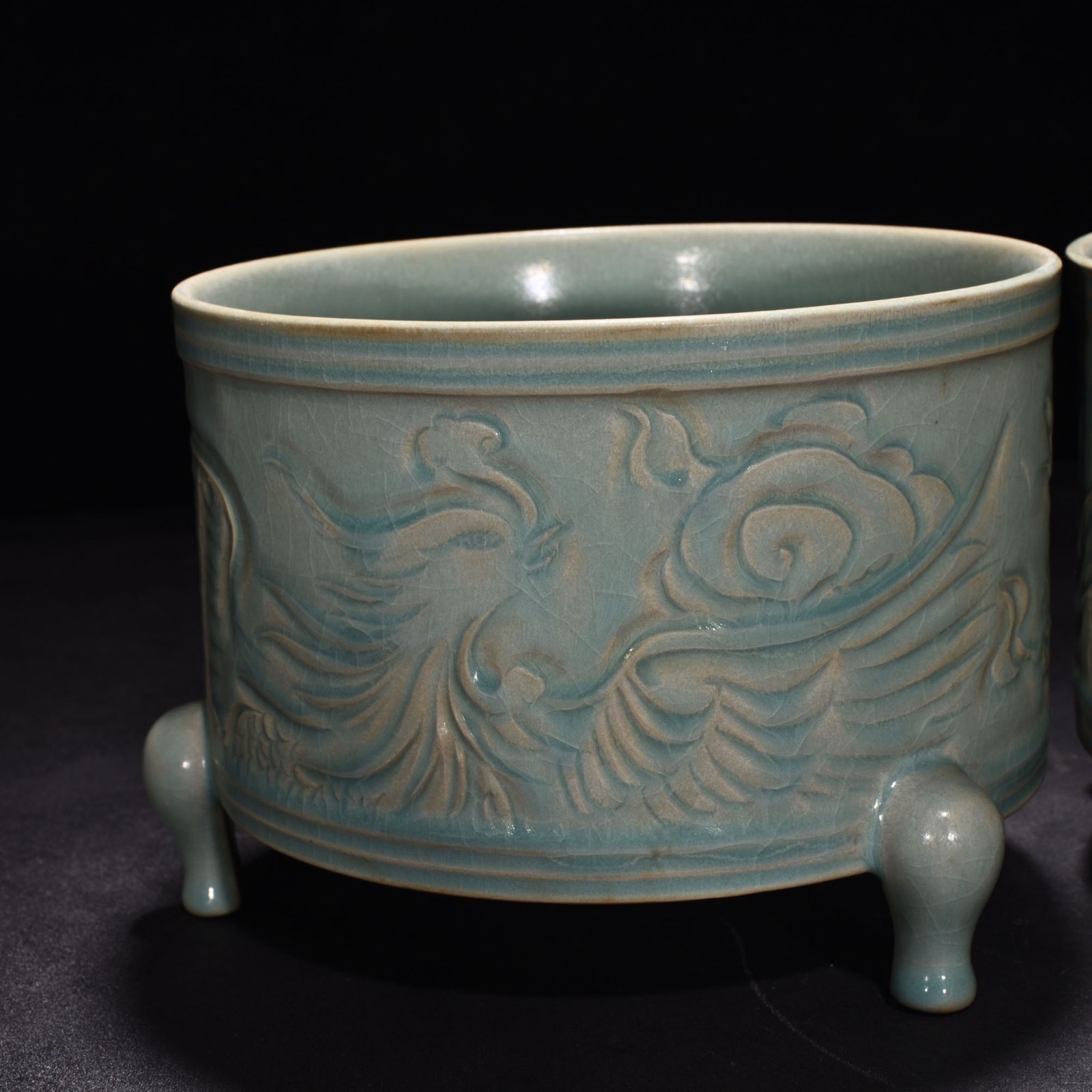 Song Dynasty Ru kiln azure glaze three legged dowry carved dragon burner