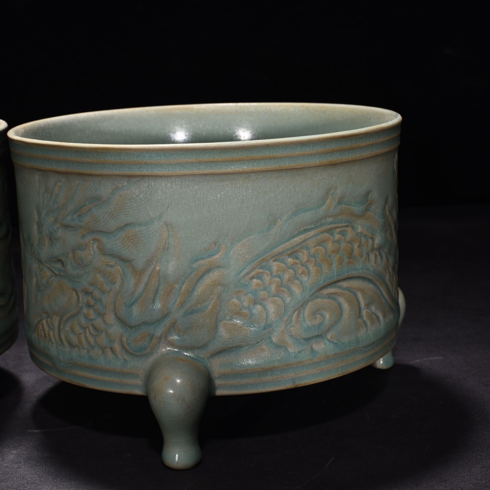 Song Dynasty Ru kiln azure glaze three legged dowry carved dragon burner