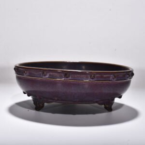 Song Dynasty Jun kiln rose purple glaze drum nail three legged washer