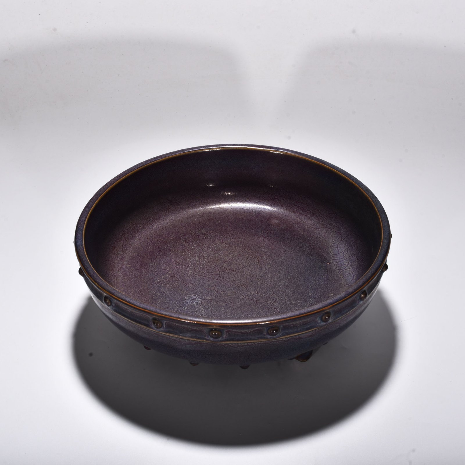 Song Dynasty Jun kiln rose purple glaze drum nail three legged washer