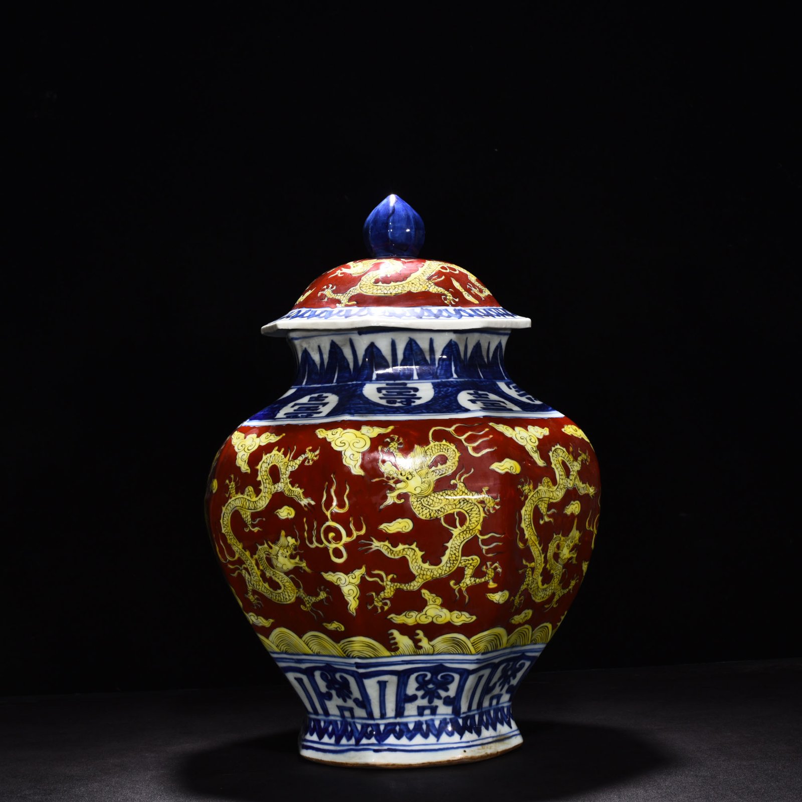 Ming Dynasty Jiajing blue and white red ground octagonal lid jar