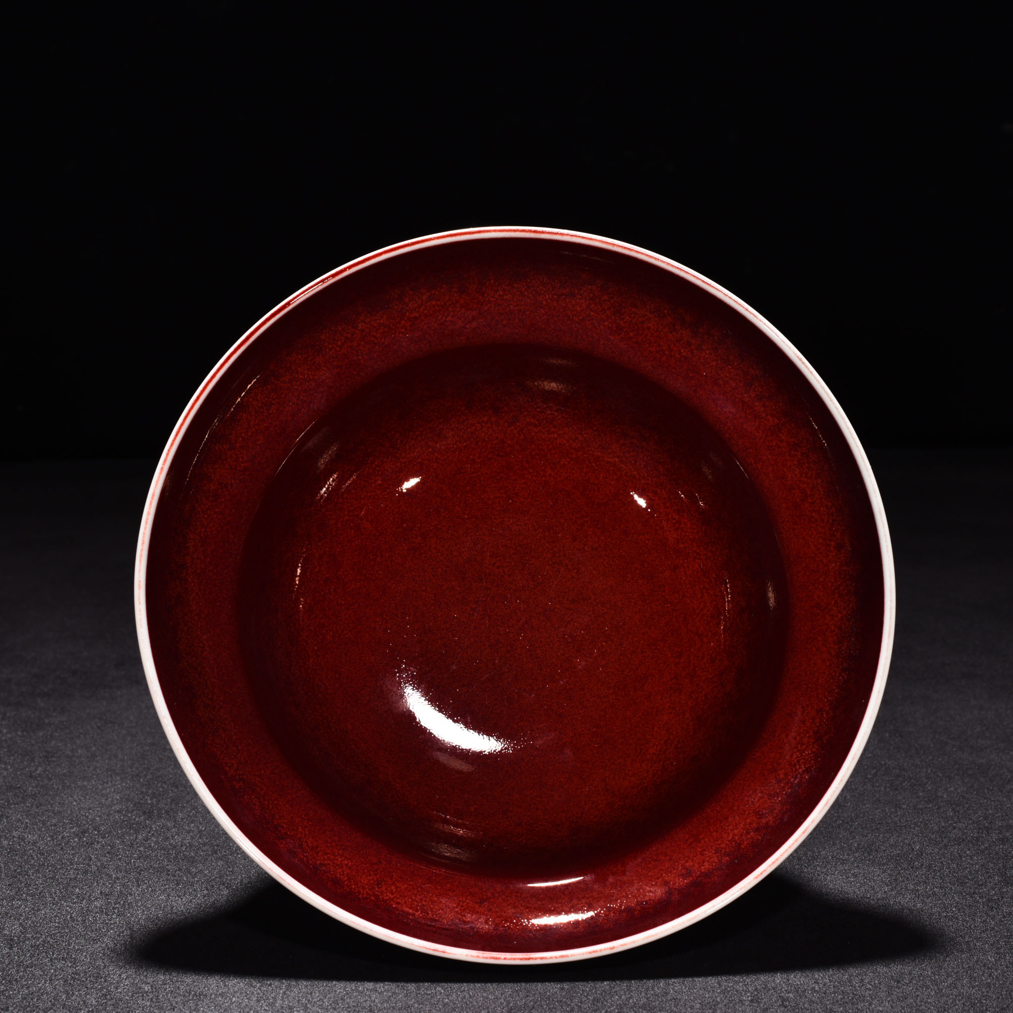Ming Dyasty Xuande Ji red glaze with white fish and algae pattern folded bowl