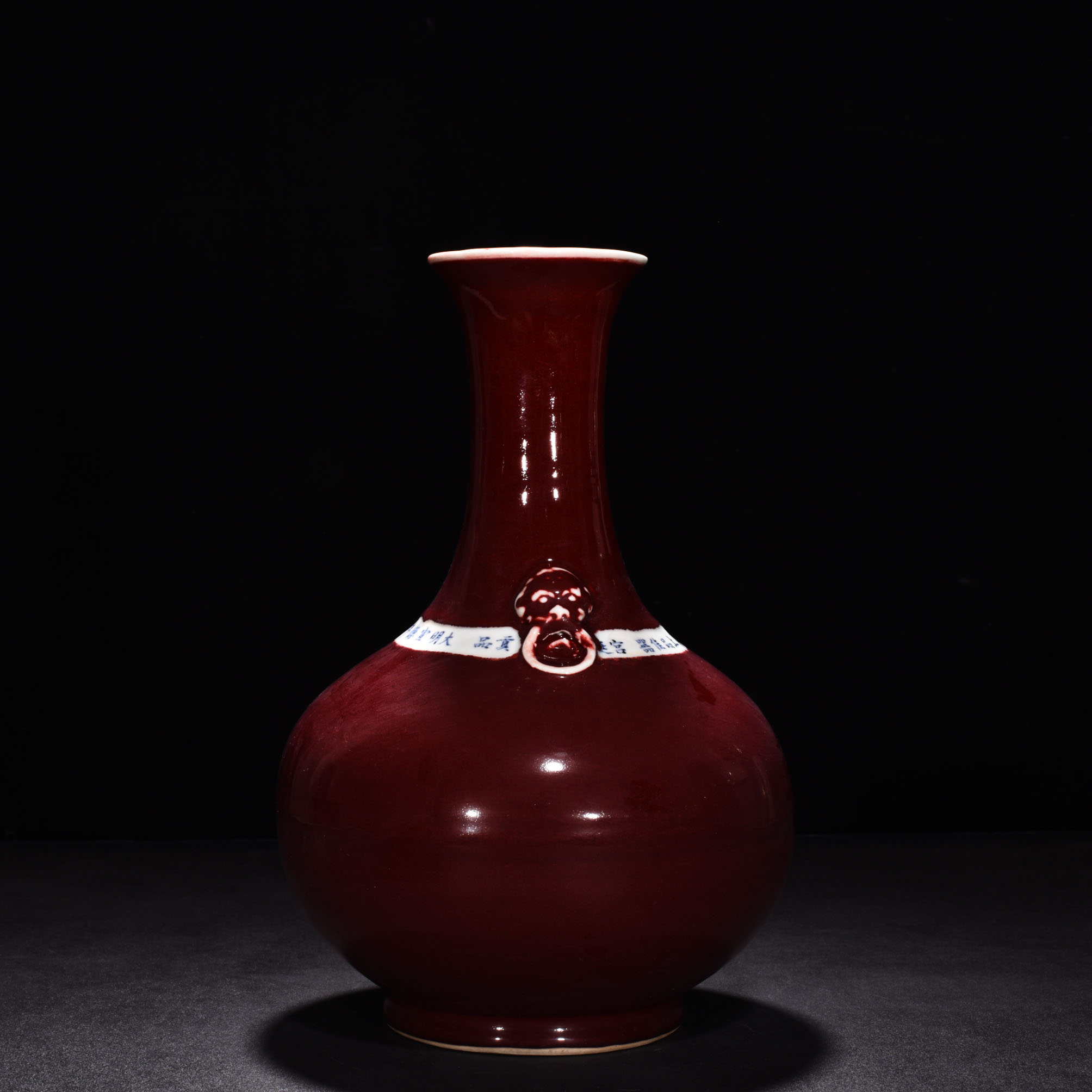 Ming Dynasty Xuande Ji red glaze ear shaped bottle