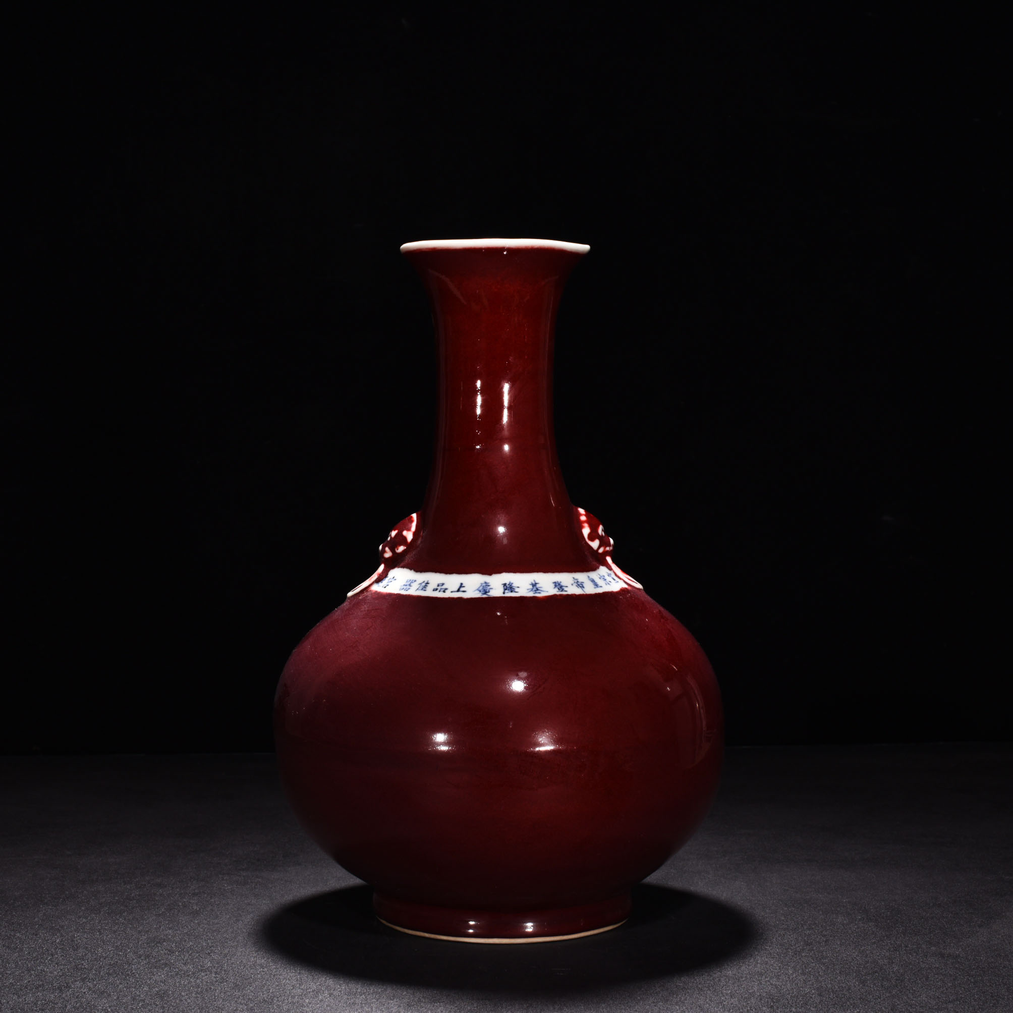 Ming Dynasty Xuande Ji red glaze ear shaped bottle