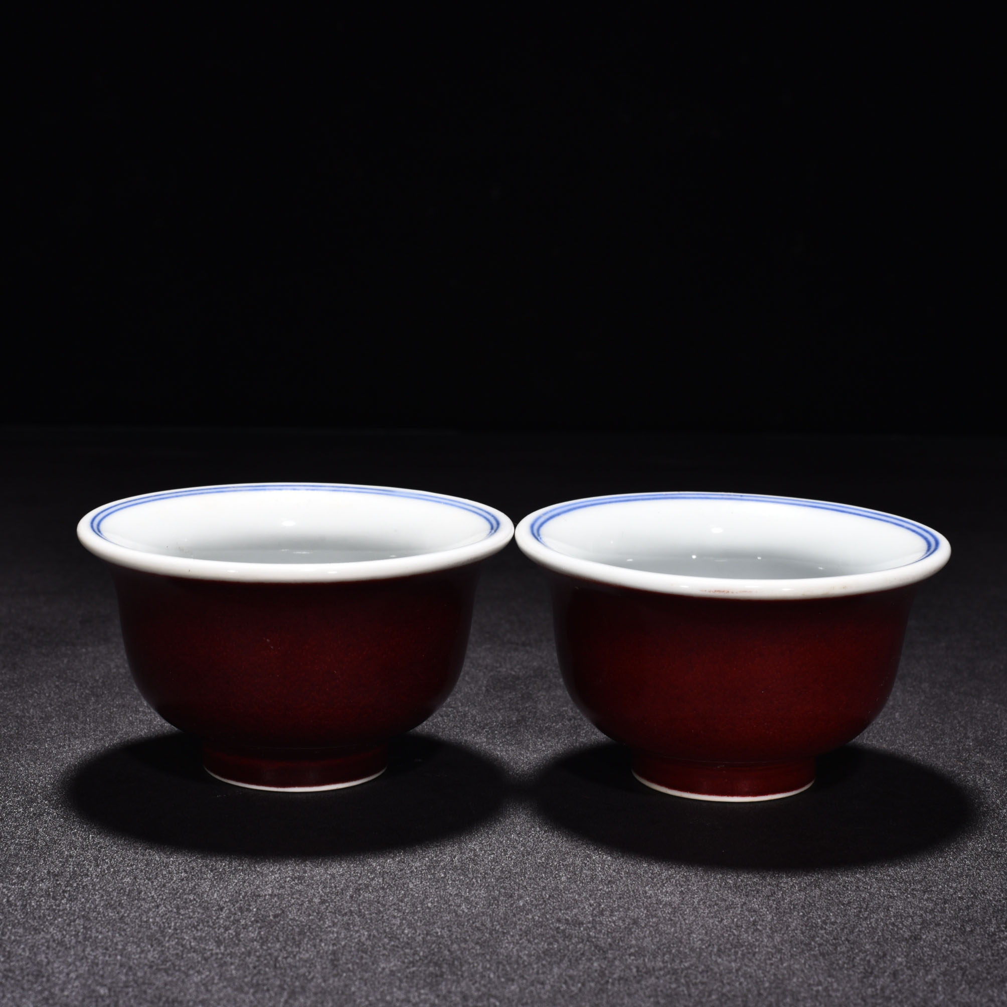 Ming Dynasty Xuande eight treasure Sanskrit red glaze pressed hand cup