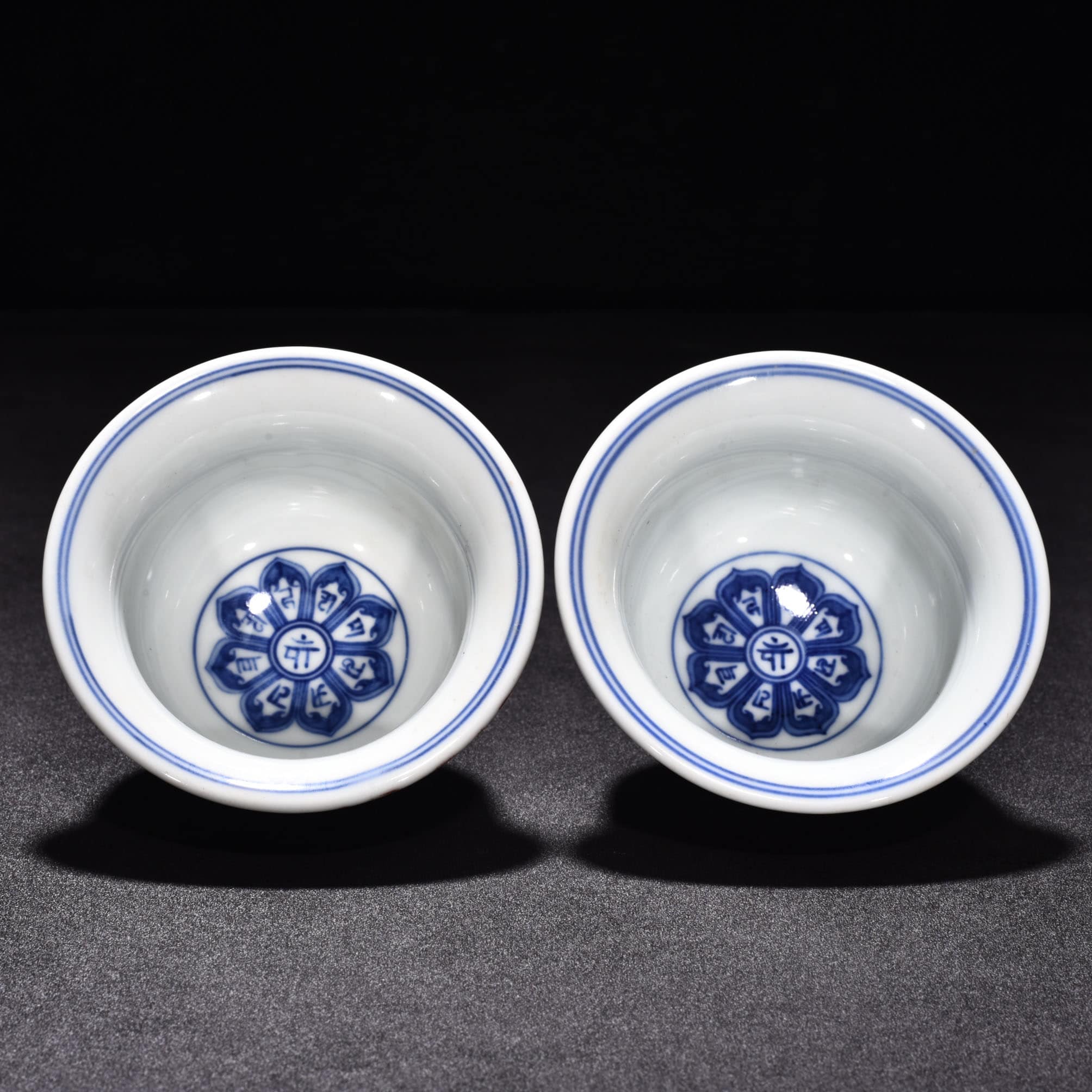 Ming Dynasty Xuande eight treasure Sanskrit red glaze pressed hand cup
