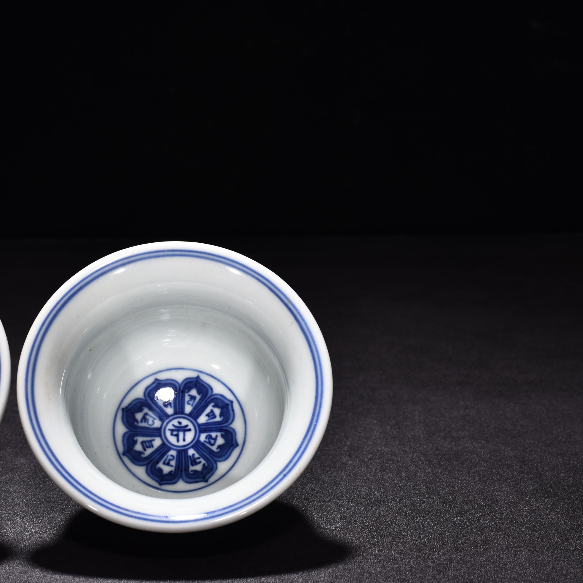 Ming Dynasty Xuande eight treasure Sanskrit red glaze pressed hand cup