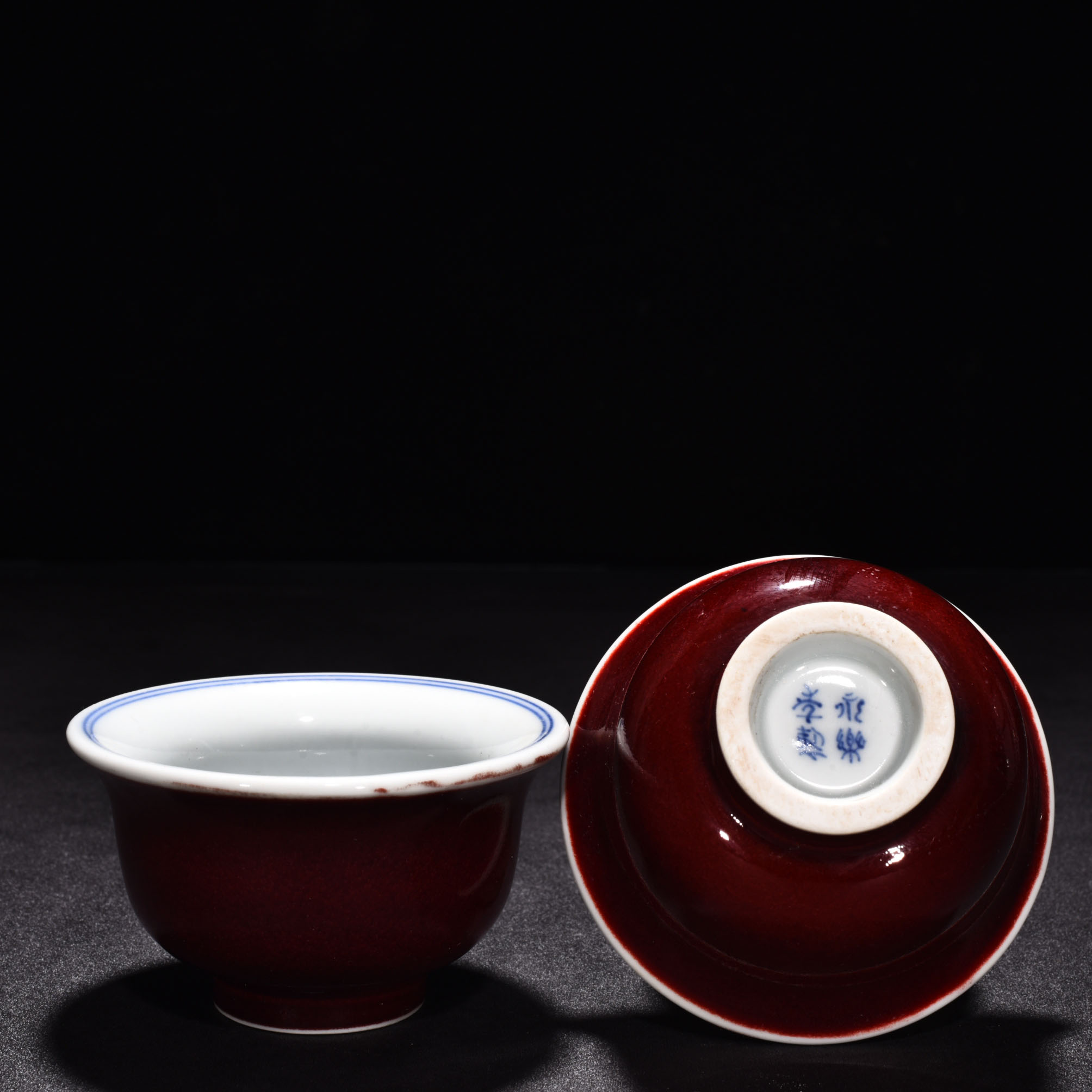 Ming Dynasty Xuande eight treasure Sanskrit red glaze pressed hand cup
