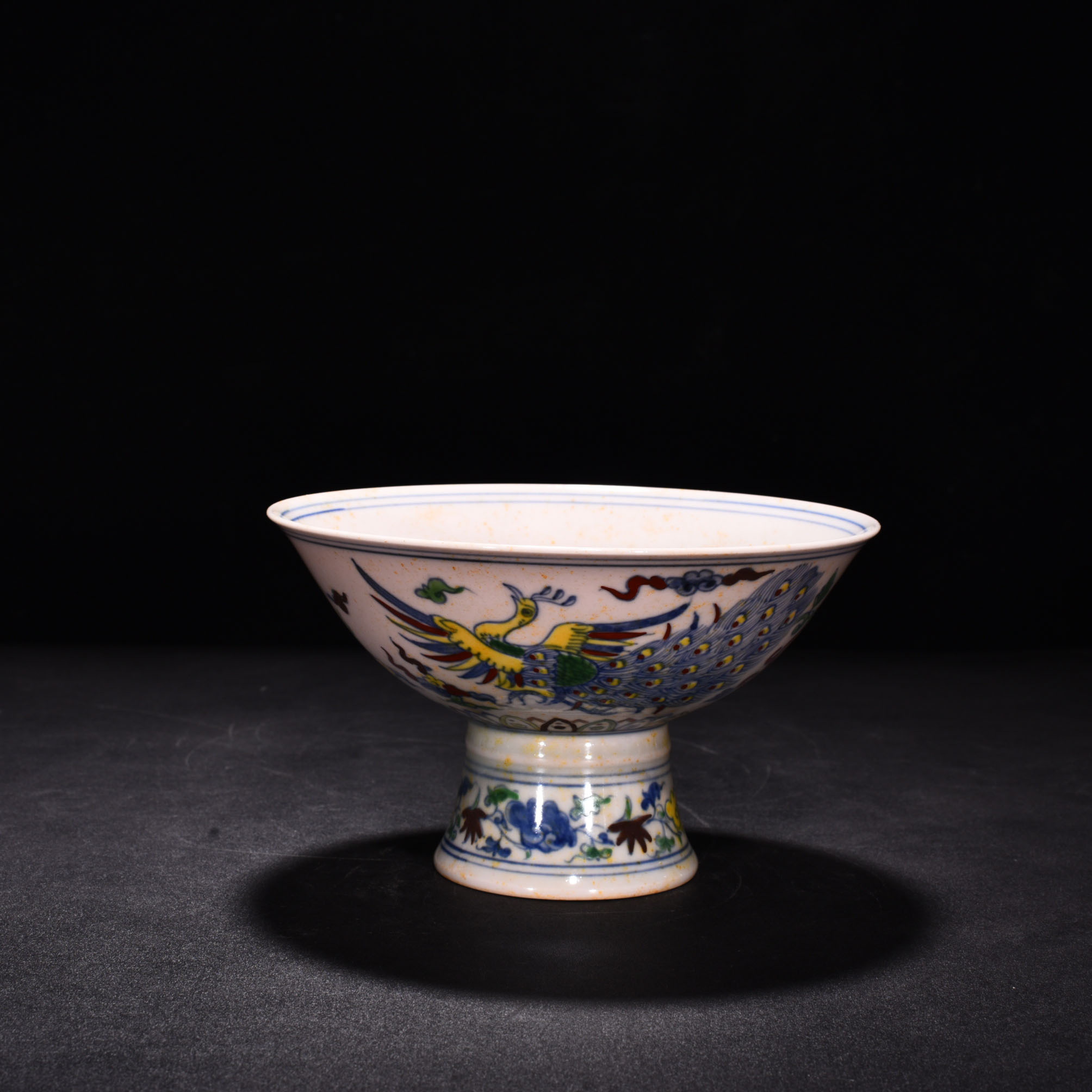 Ming Dynasty Chenghua red body bowl with colorful purple peacock pattern