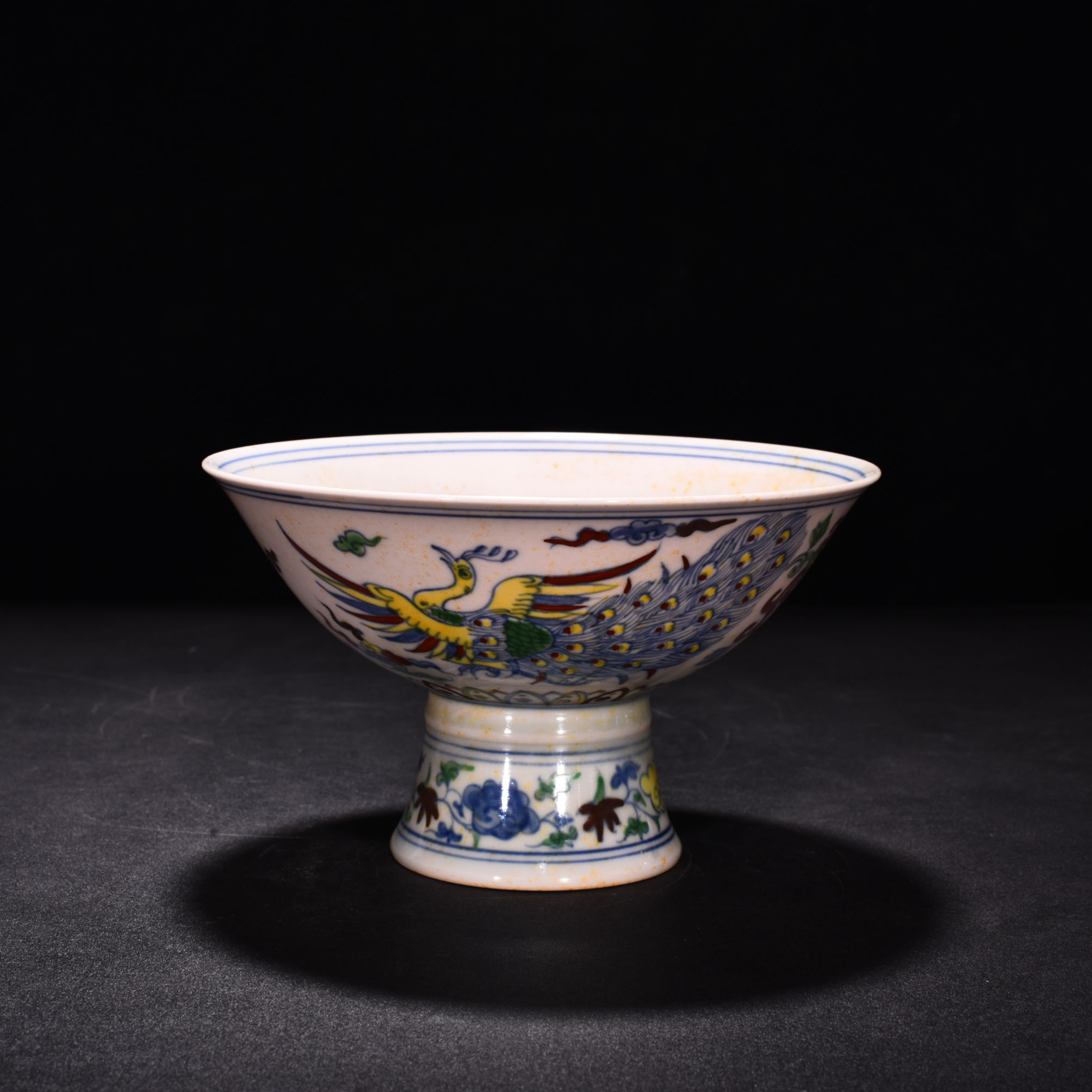 Ming Dynasty Chenghua red body bowl with colorful purple peacock pattern