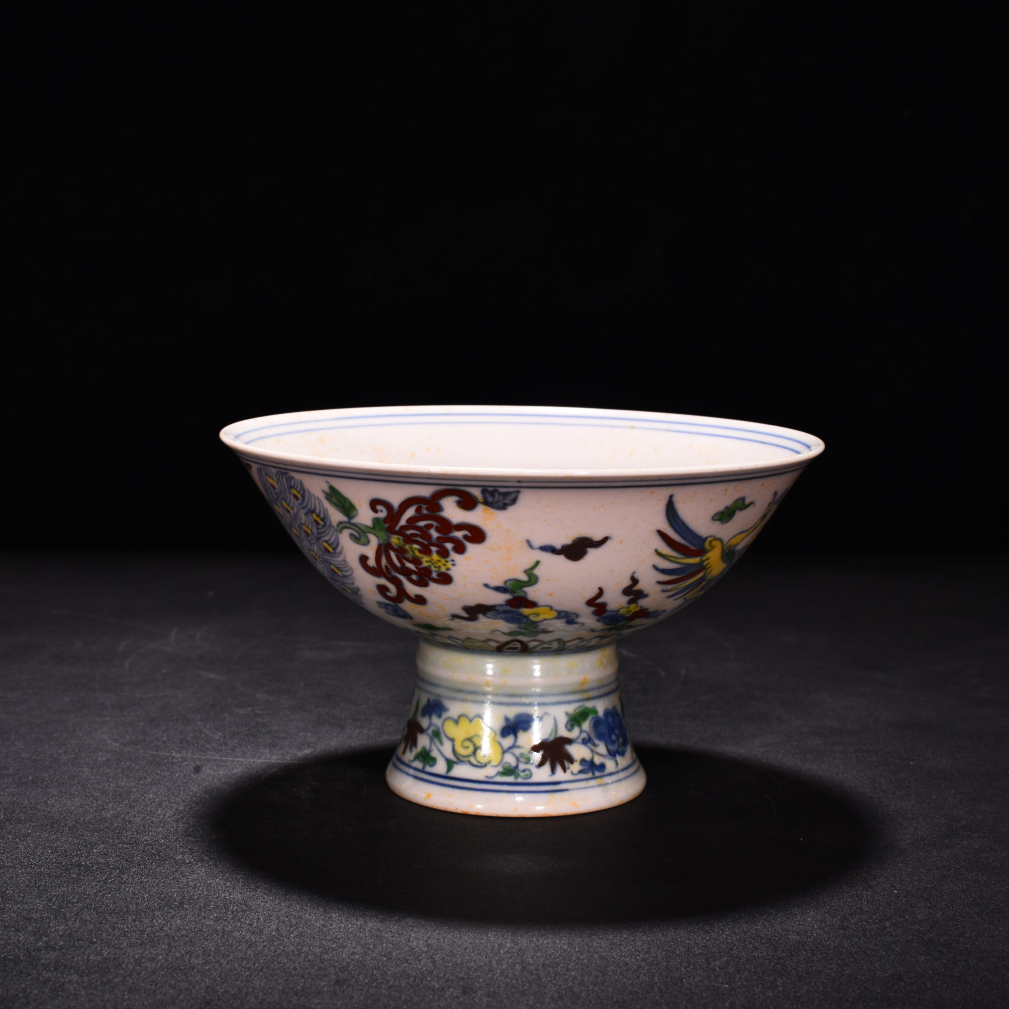 Ming Dynasty Chenghua red body bowl with colorful purple peacock pattern