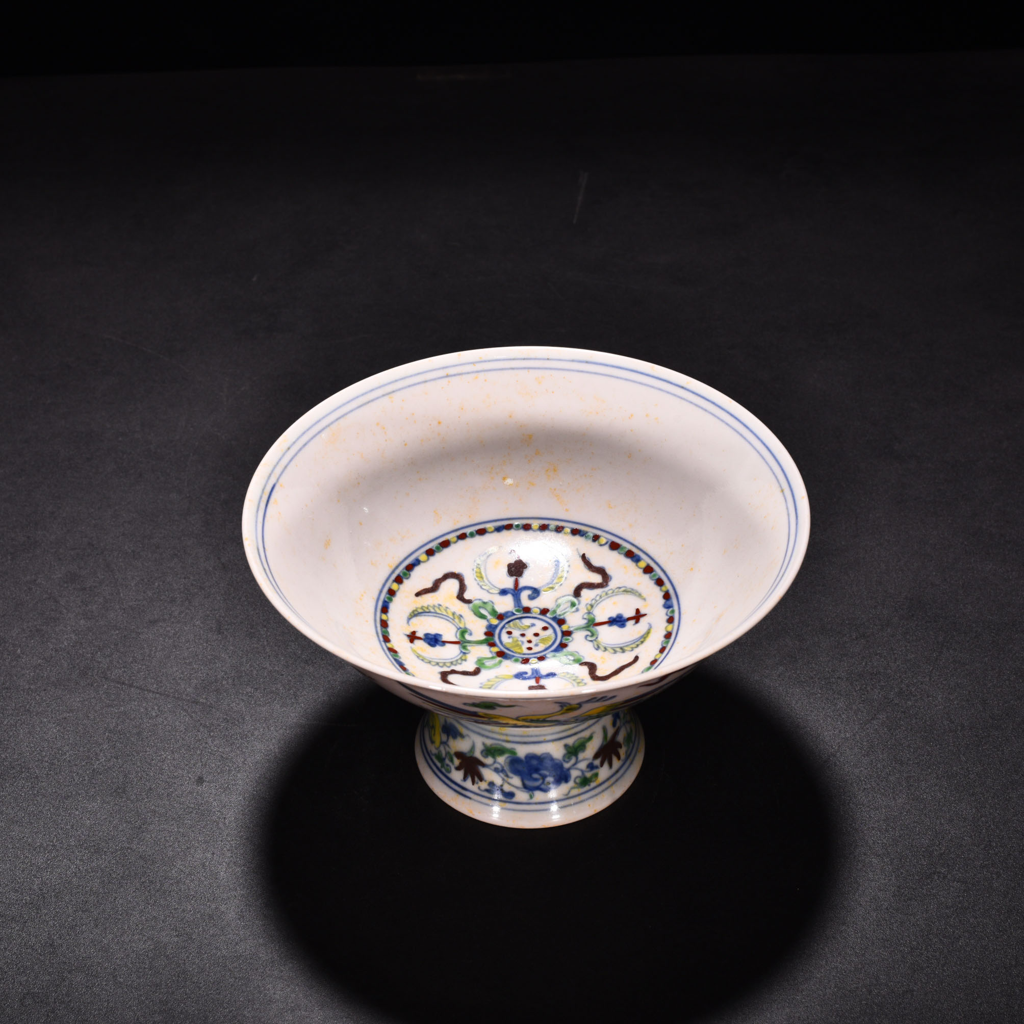 Ming Dynasty Chenghua red body bowl with colorful purple peacock pattern