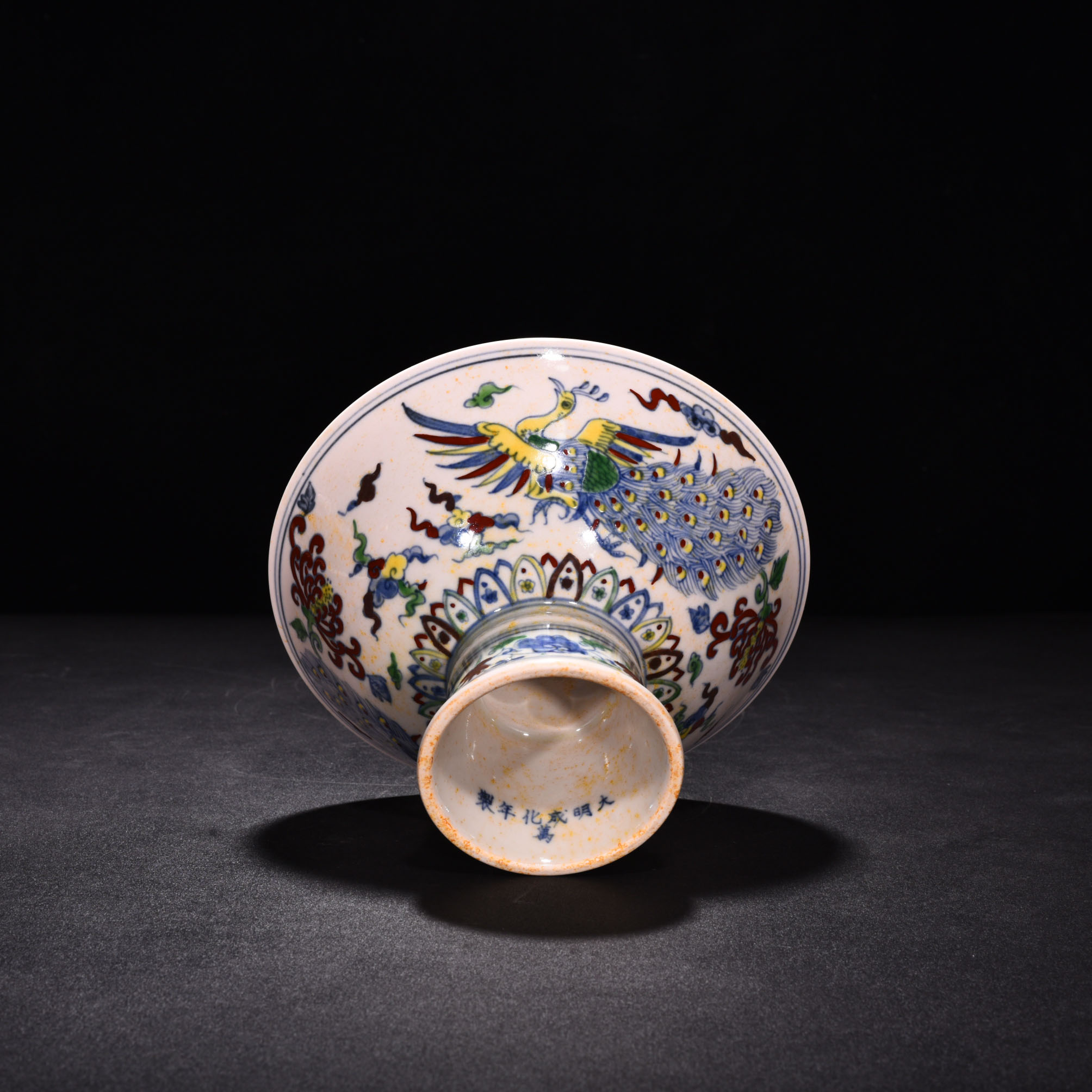 Ming Dynasty Chenghua red body bowl with colorful purple peacock pattern