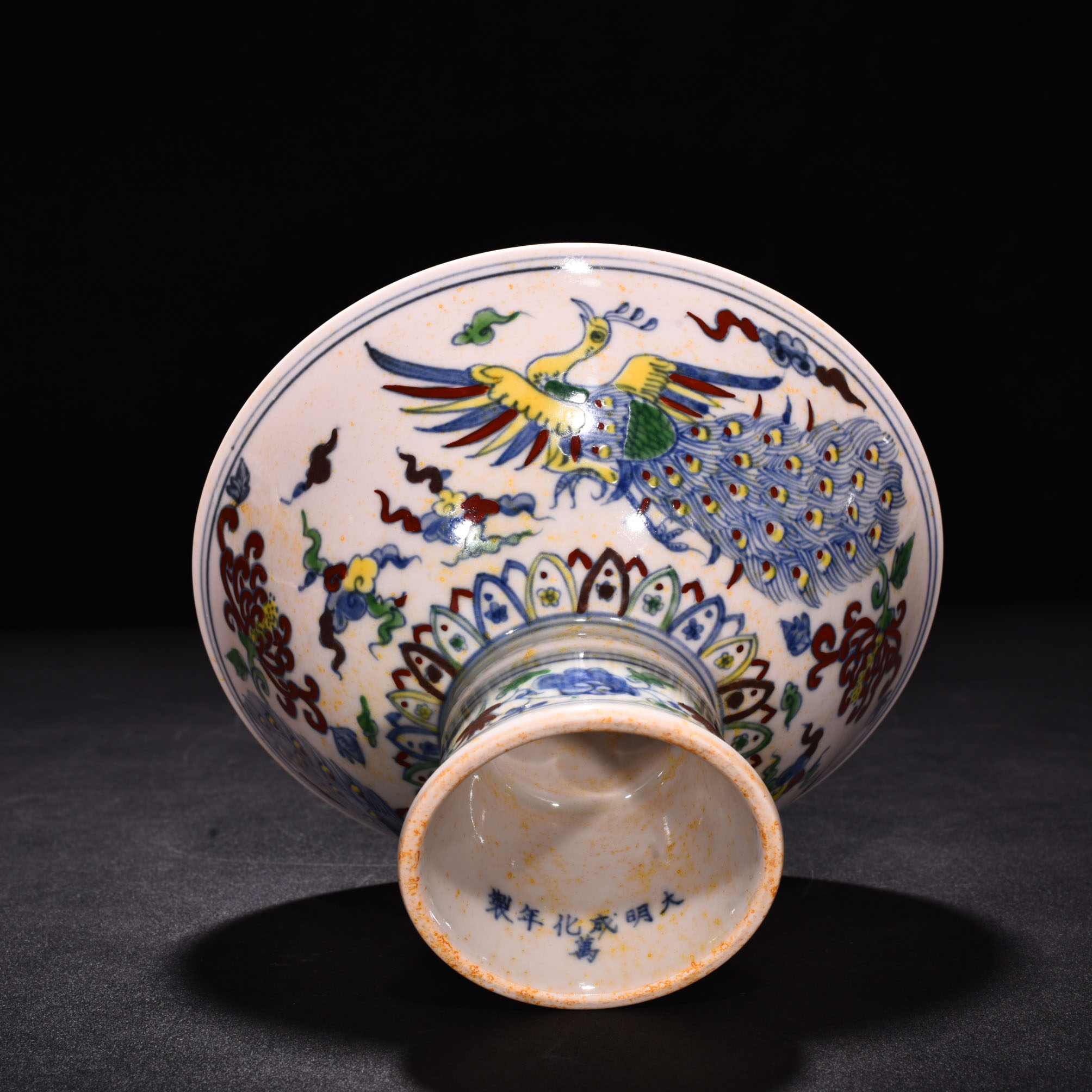 Ming Dynasty Chenghua red body bowl with colorful purple peacock pattern