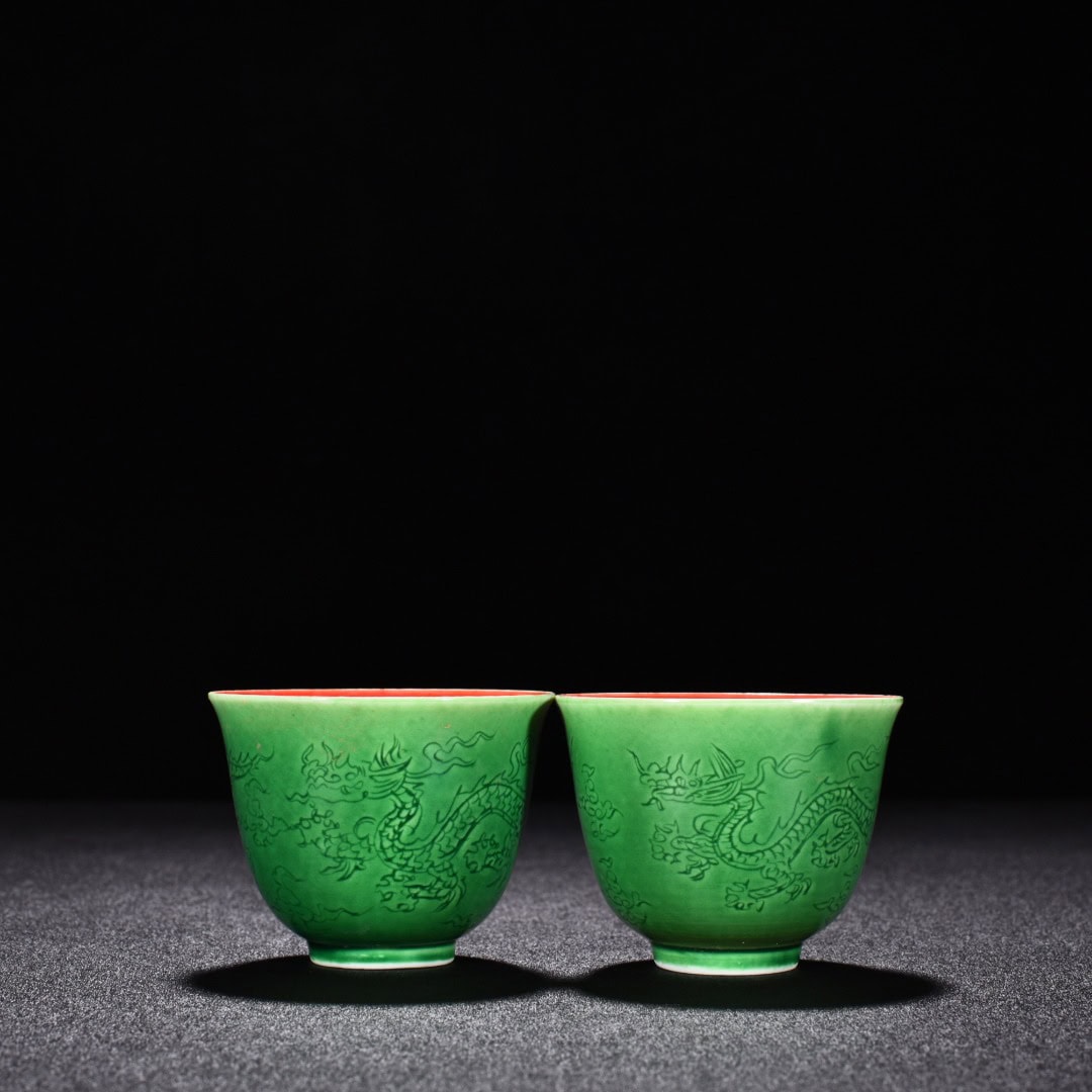 Ming Dynasty Chenghua green glaze cup with cloud and dragon pattern