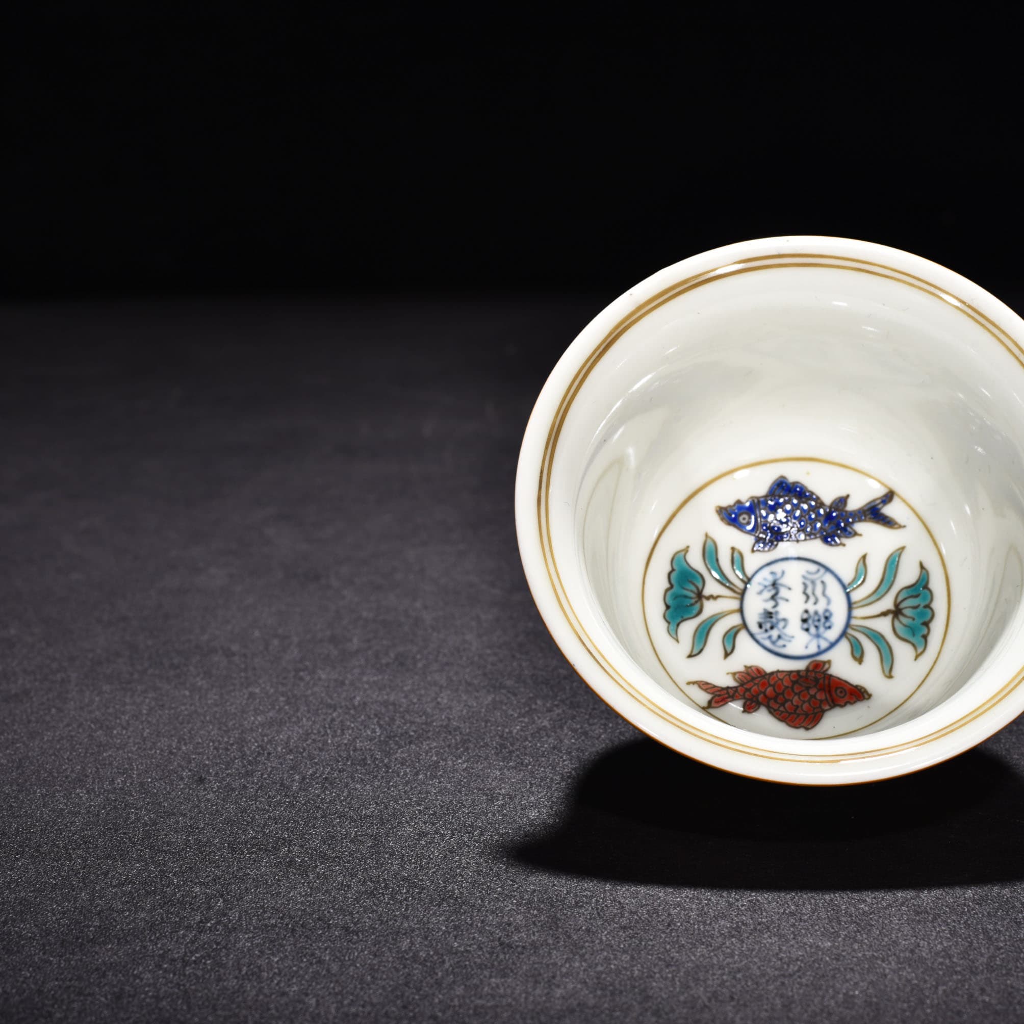 Ming Dynasty Yongle gold colored fish and algae pattern hand cup