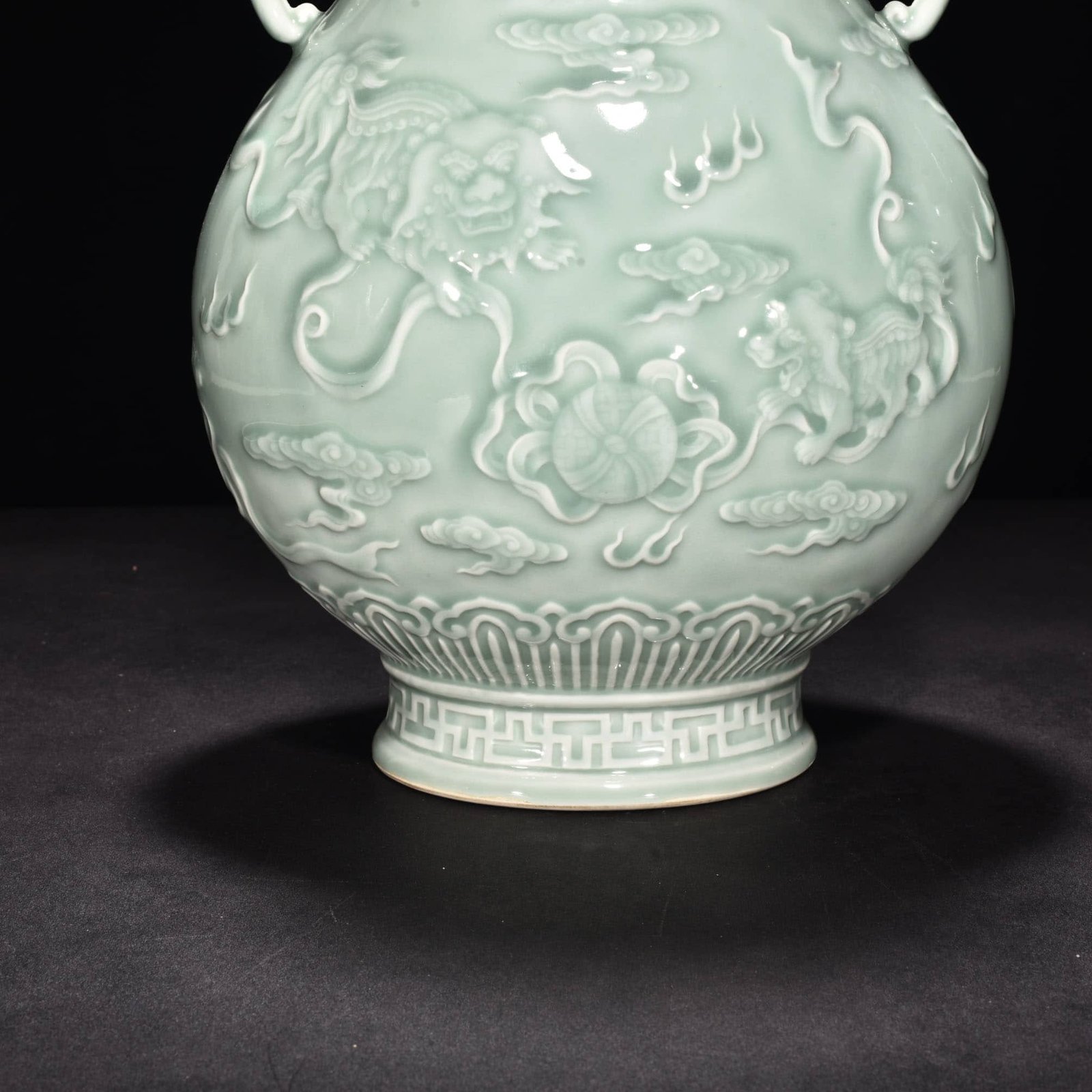 Qing Dynasty Qianlong pink celadon glaze carving vase