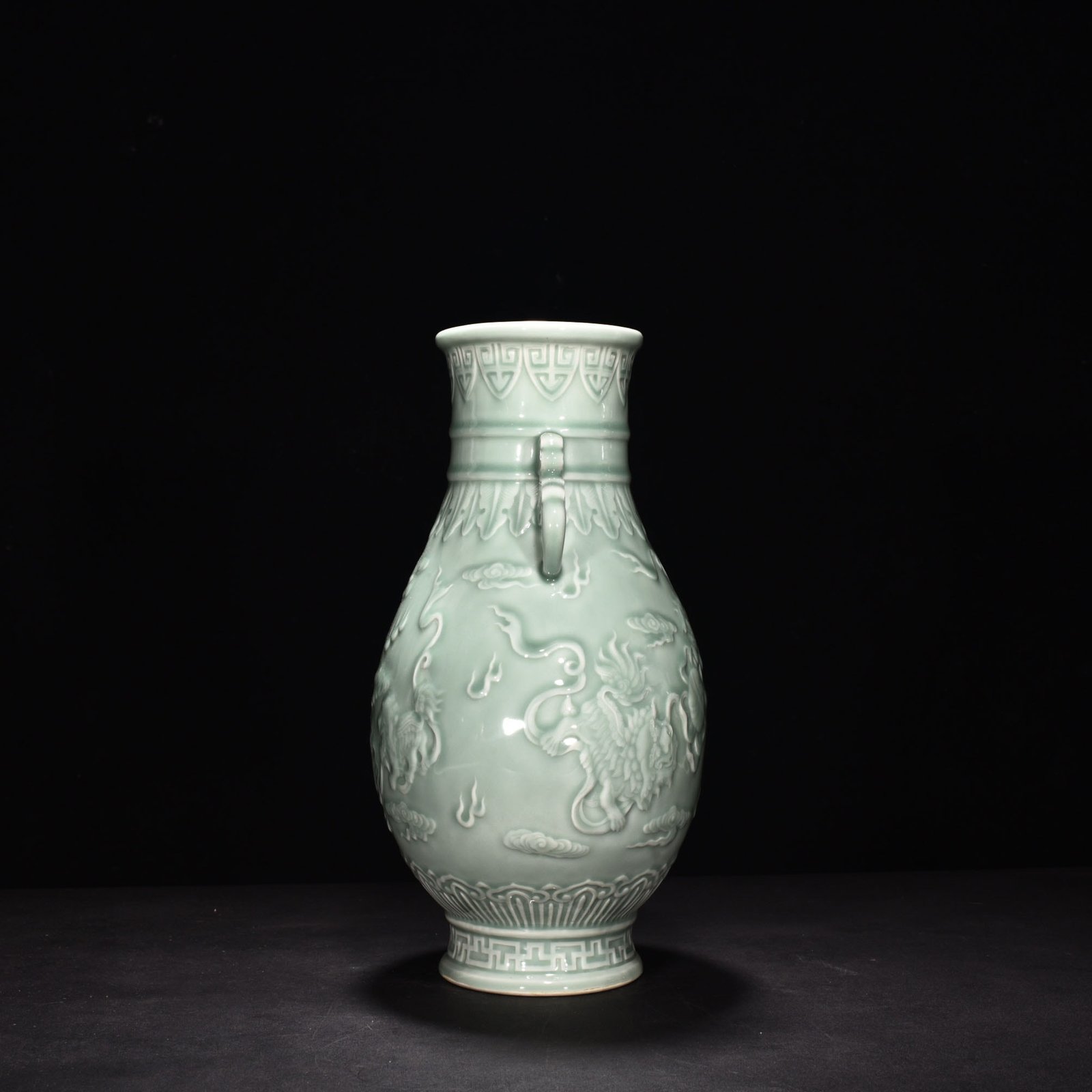 Qing Dynasty Qianlong pink celadon glaze carving vase