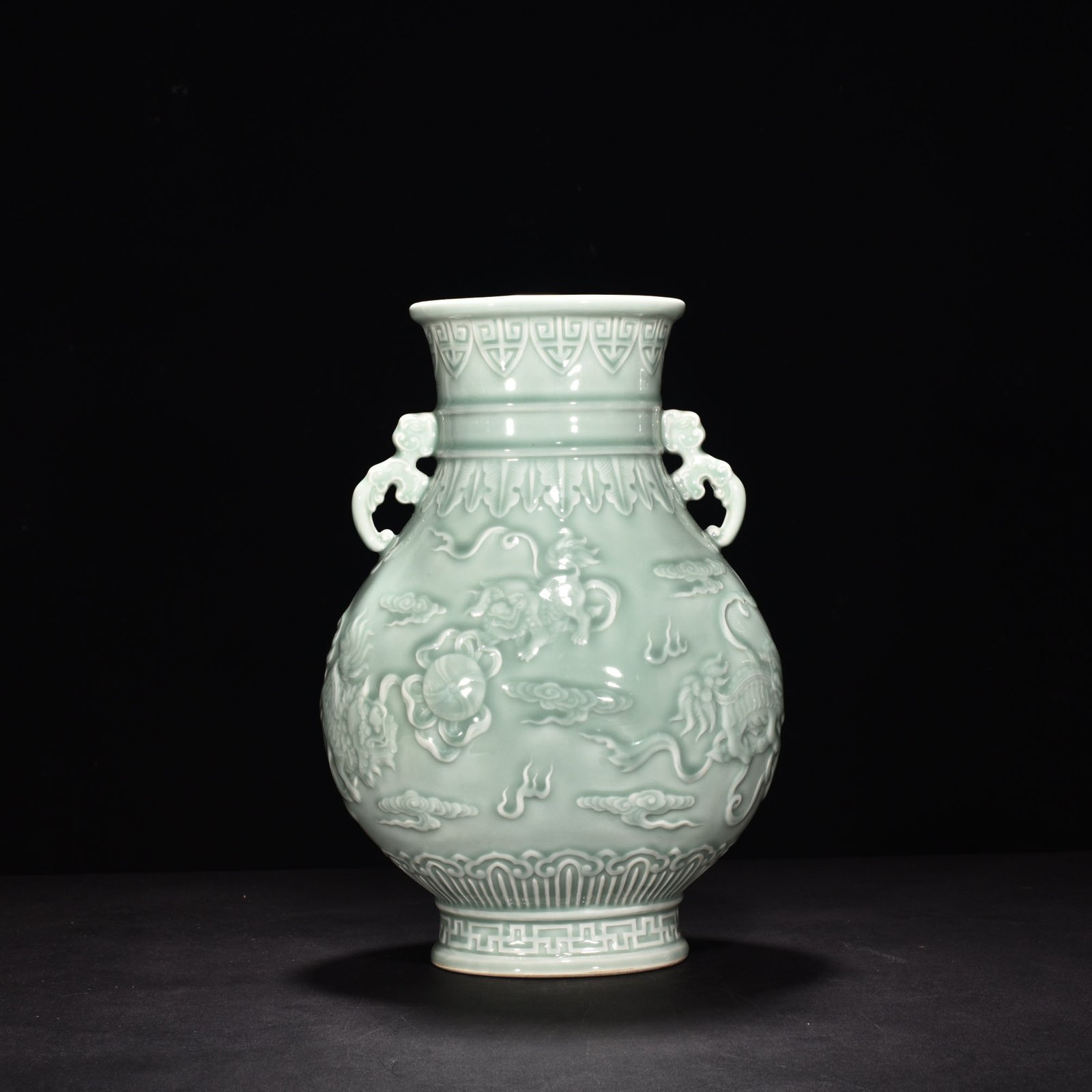 Qing Dynasty Qianlong pink celadon glaze carving vase