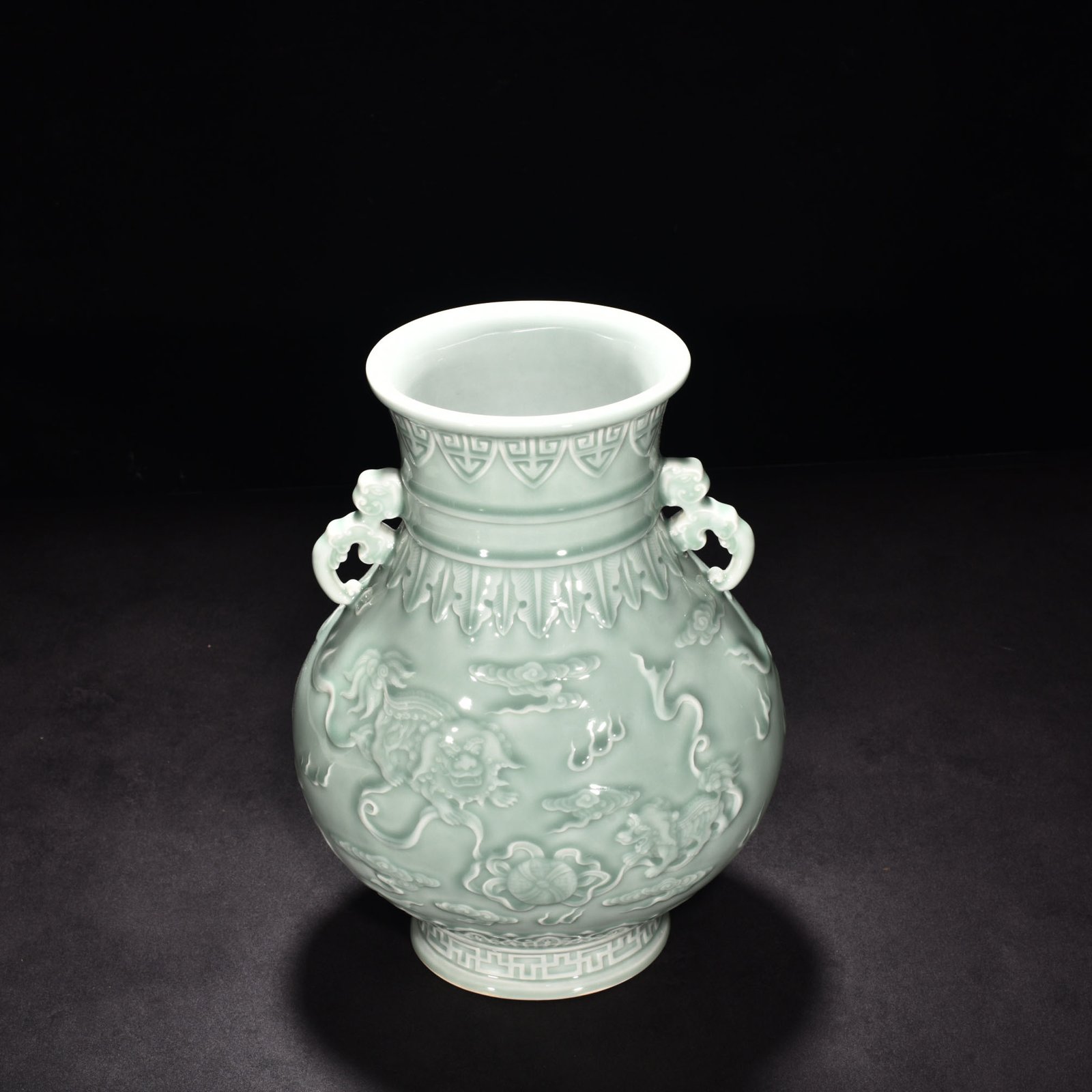 Qing Dynasty Qianlong pink celadon glaze carving vase