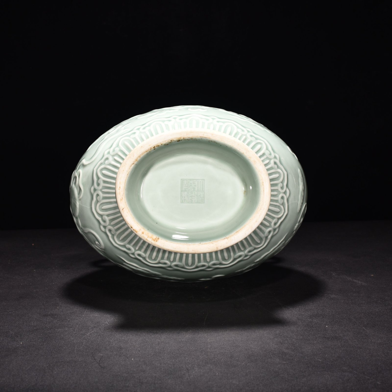 Qing Dynasty Qianlong pink celadon glaze carving vase