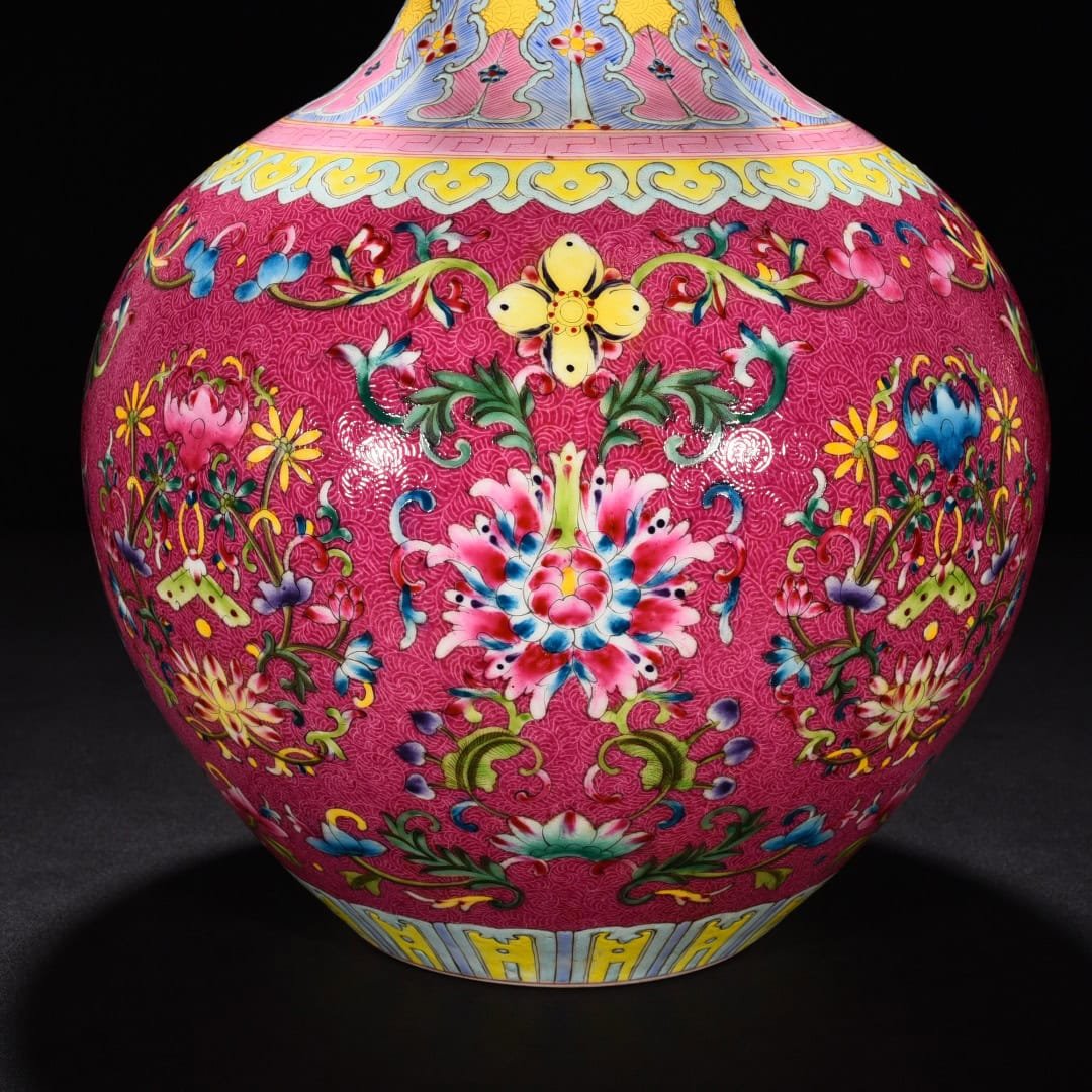 Qing Dynasty Qianlong red ground rolled celestial sphere vase