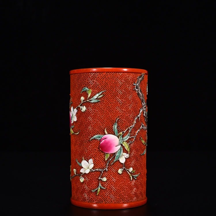 Qing Dynasty Qianlong red ground carved pen holder