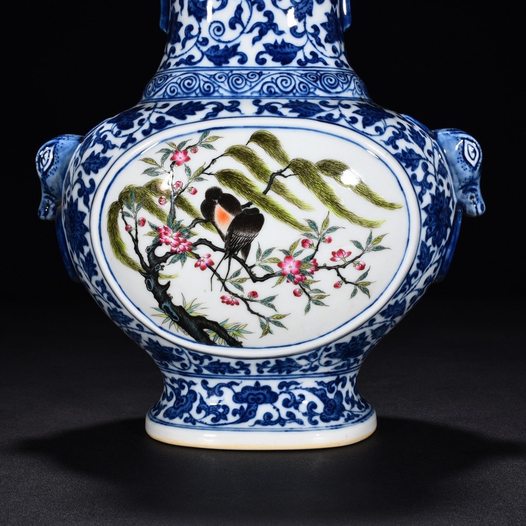 Qing Dynasty Qianlong blue and whitespring swallow flat vase