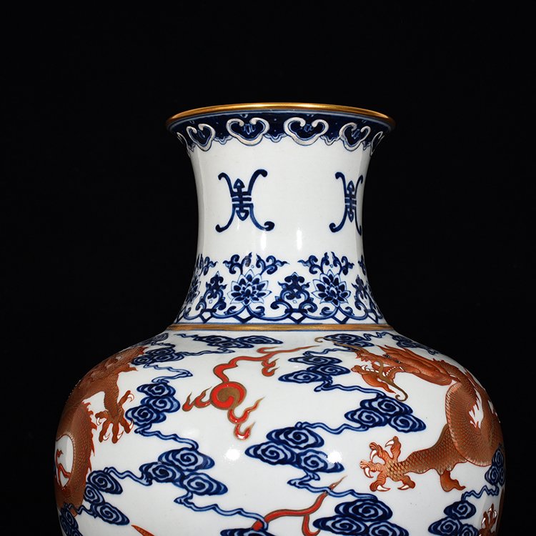 Qing Dynasty Qianlong blue and white alum red Guanyin vase
